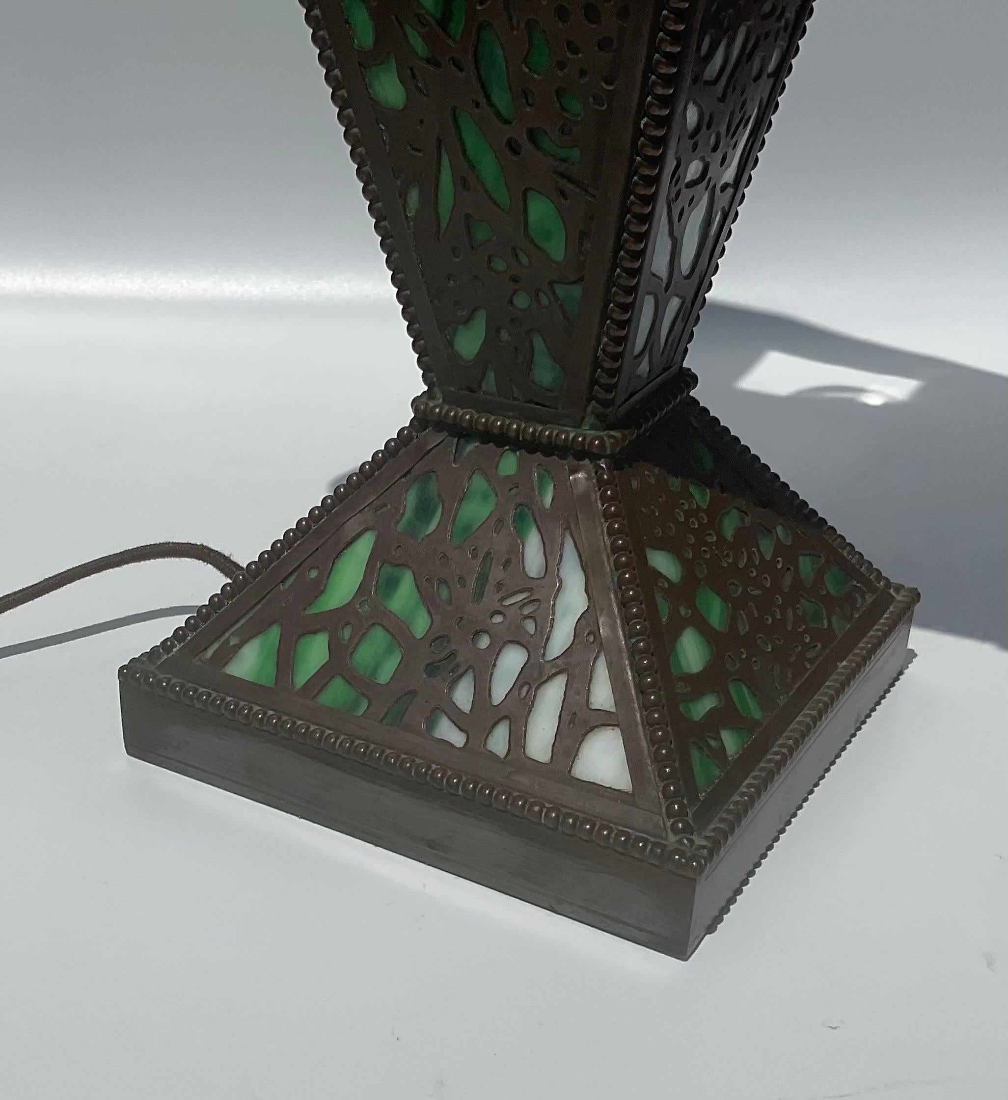 Rivière Studios Grapevine Pattern Early Art Nouveau panel Lamp Made in the style of Tiffany Studios. The lamp glows nicely on any table. A rare find.