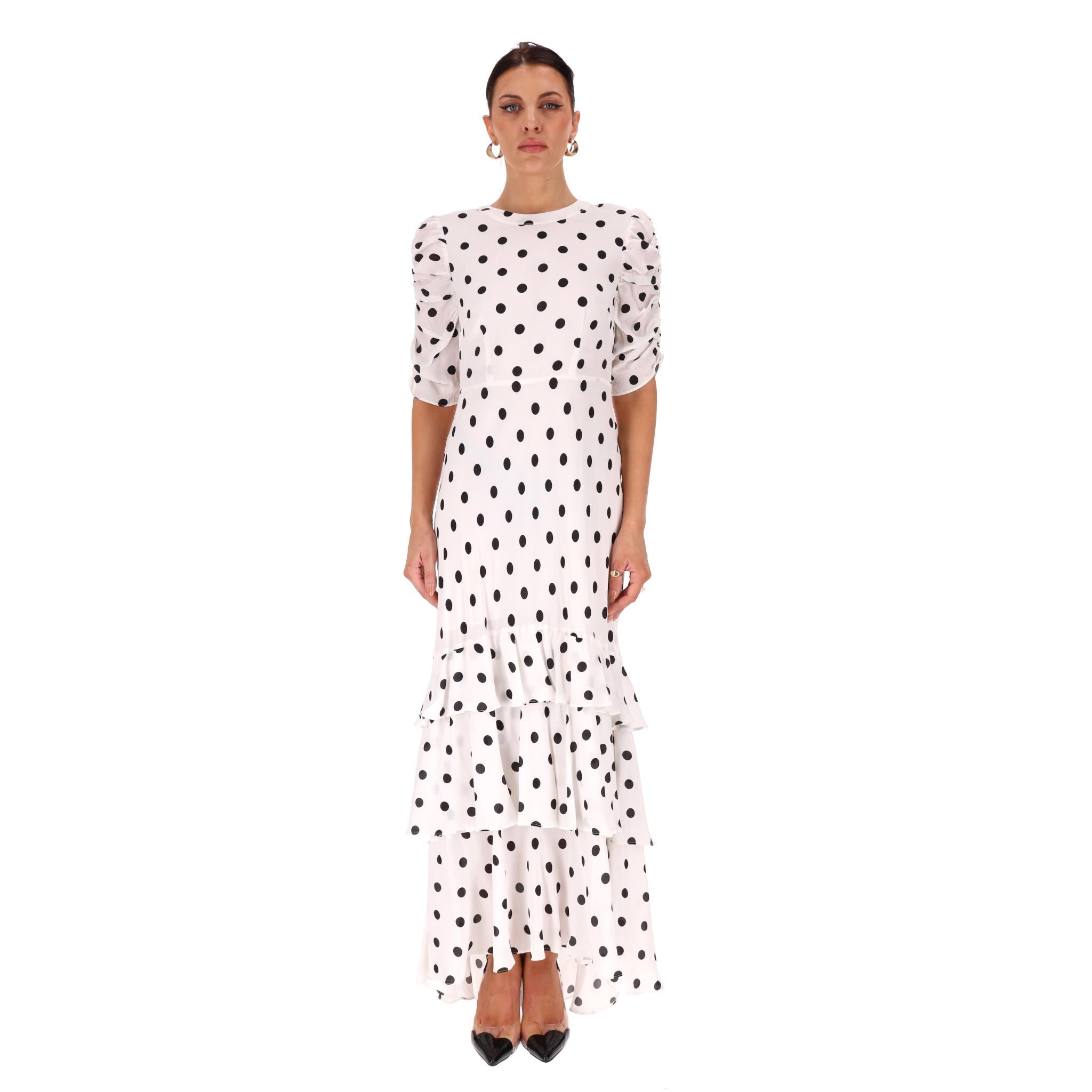 Maxivestido con volantes de mezcla de seda y lunares Rixo

Maxivestido blanco confeccionado en mezcla de seda con estampado integral de lunares en negro.

Con escote redondo, mangas fruncidas y bajo con volantes.

Precio aprox. 450

Talla -