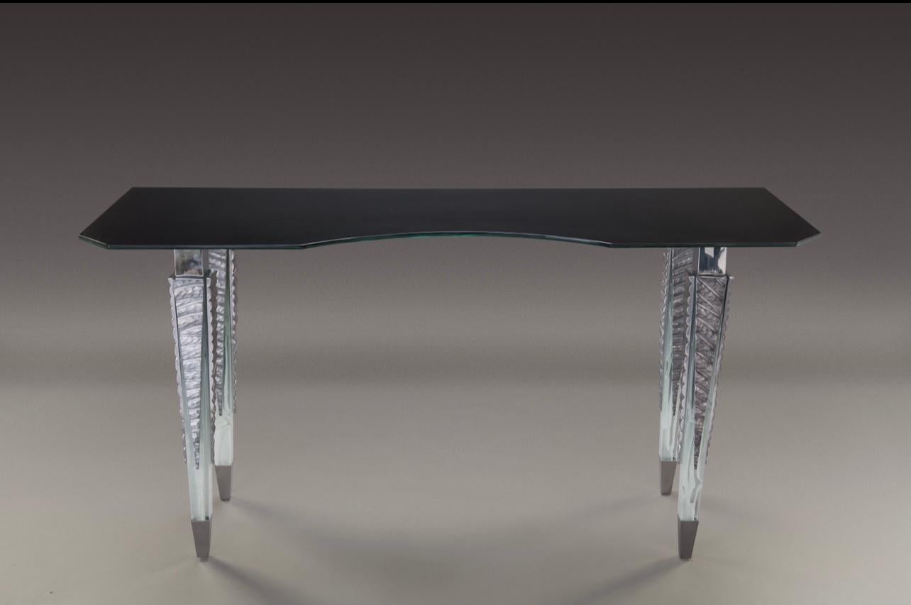 The expertly crafted and effortlessly sensual Gemma Console table creates a memorable piece of furniture for refined interiors. The natural materiality and handmade finish of all features are unique and manufactured according to strict artisan