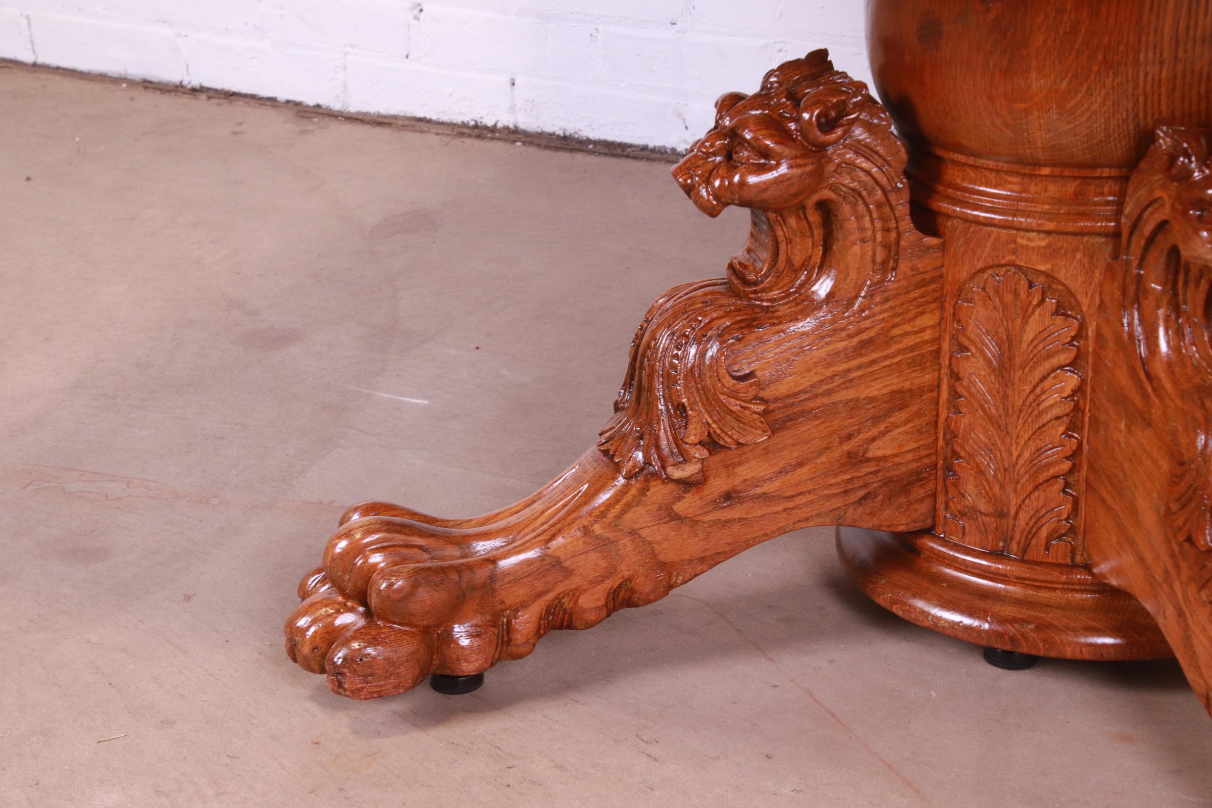 R.J. Horner Antique Victorian Oak Pedestal Dining Table with Carved Lions For Sale 4