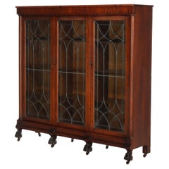 RJ Horner Arts & Crafts Oak & Leaded Glass 3-Door Claw Foot Bookcase c1920