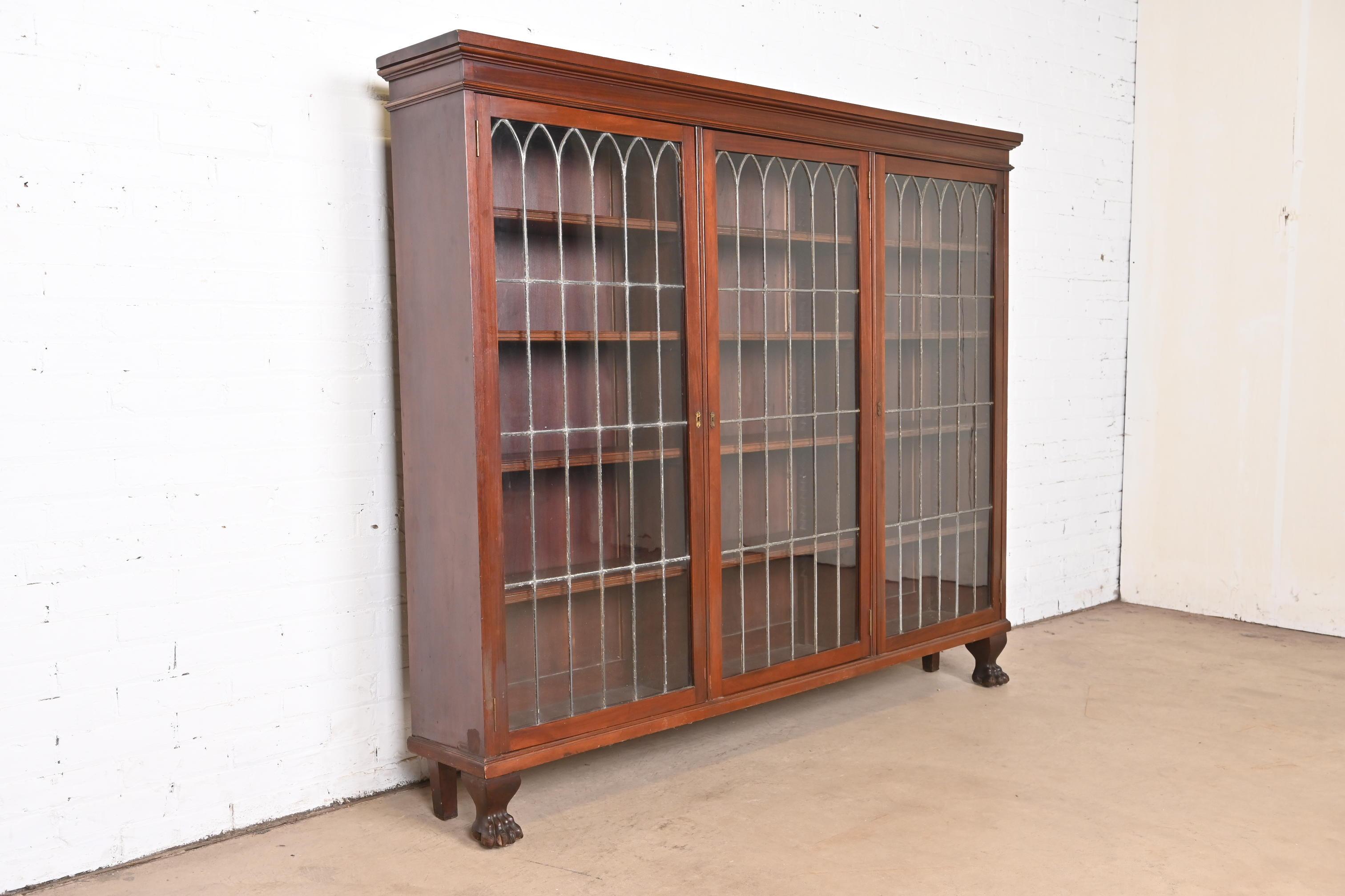 R.J. Horner Style Victorian Carved Mahogany Leaded Glass Triple Bookcase In Good Condition In South Bend, IN