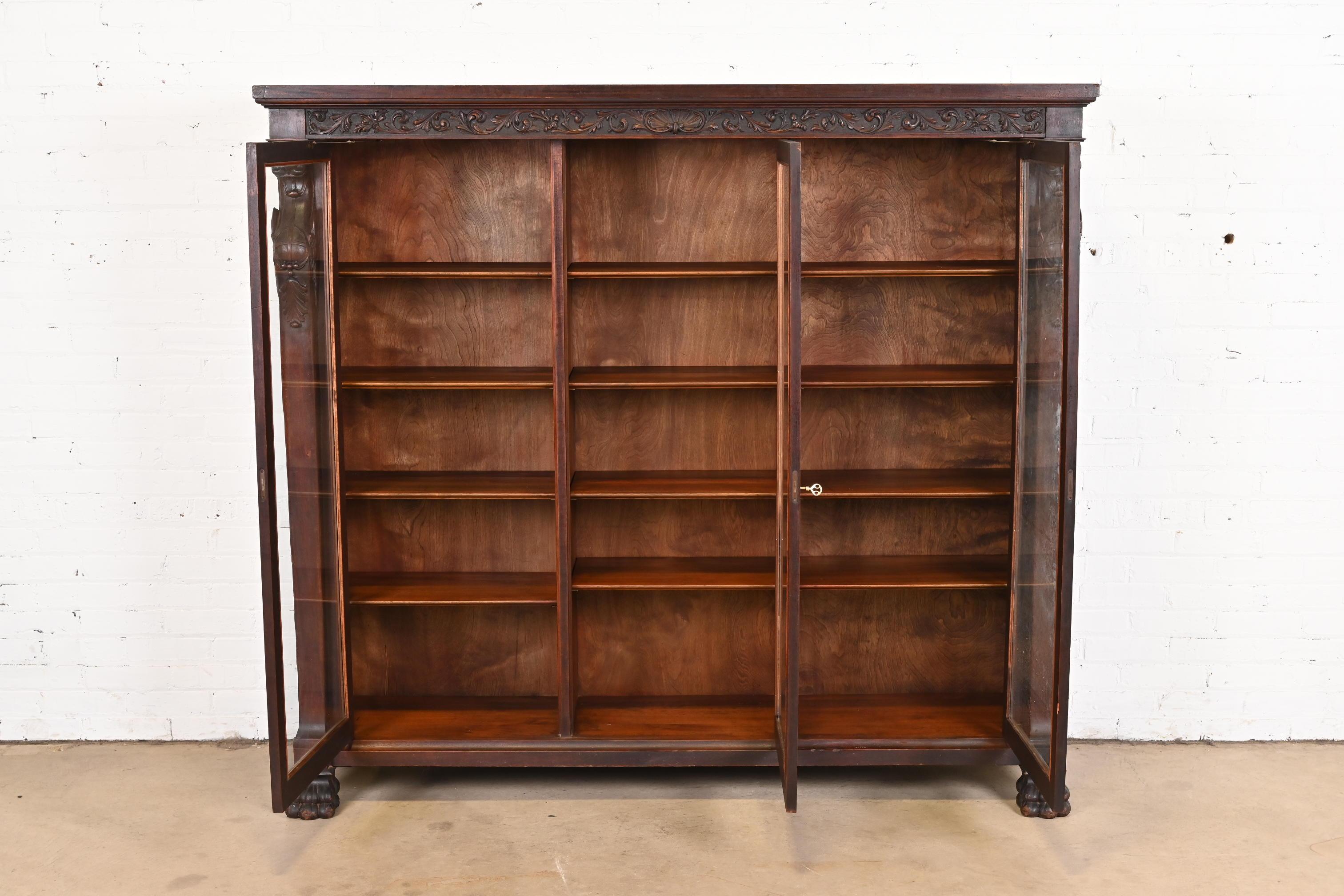R.J. Horner Victorian Mahogany Triple Bookcase with Carved Griffins, circa 1890 7
