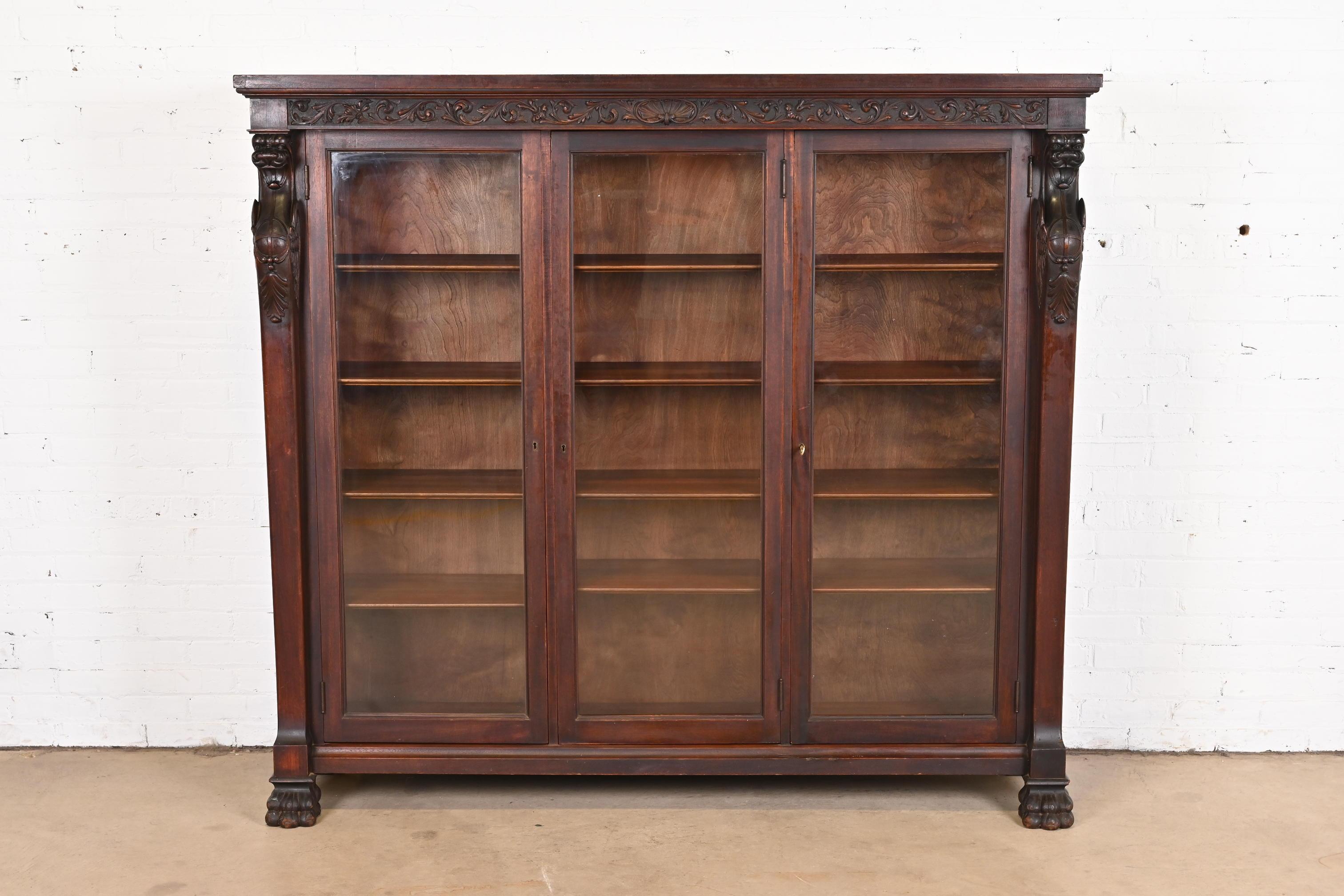 R.J. Horner Victorian Mahogany Triple Bookcase with Carved Griffins, circa 1890 In Good Condition In South Bend, IN
