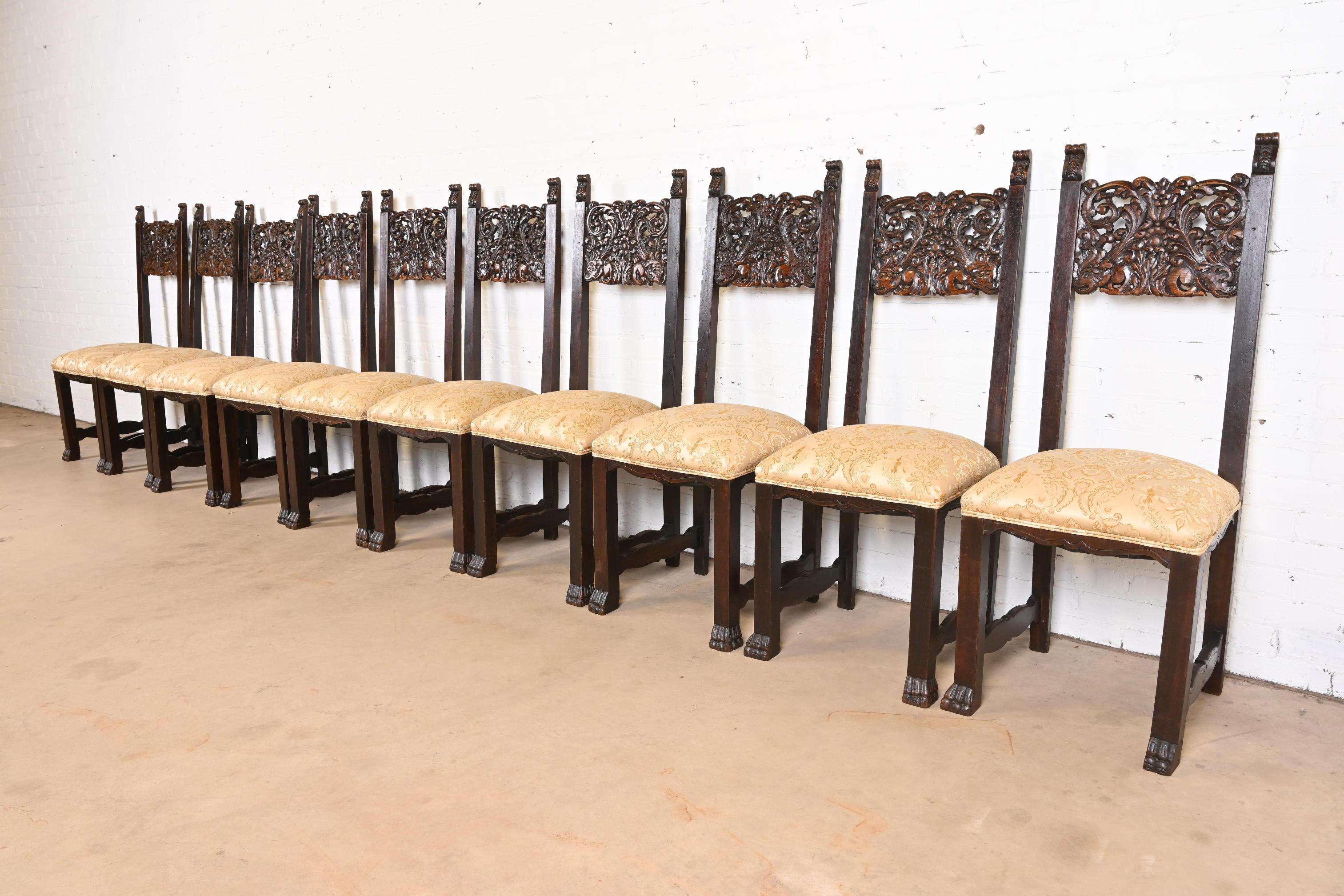 Exceptionnel ensemble de dix chaises de salle à manger à haut dossier de style victorien ou néo-Renaissance

Attribué à J.R. Horner & Co.

États-Unis, vers 1890

Chêne sculpté et orné, avec des sièges rembourrés et des pieds en patte