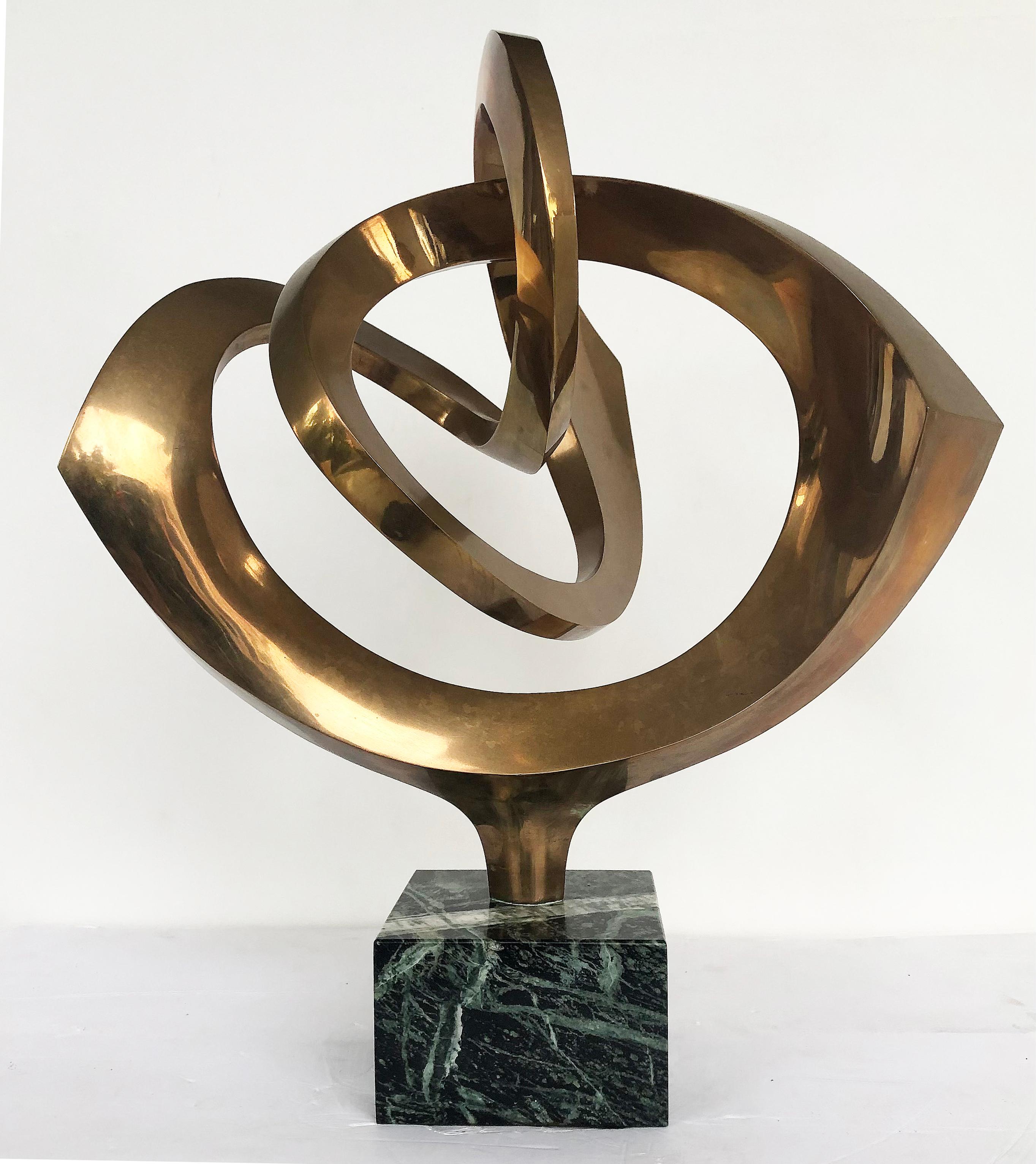 Robert J Mitchell Abstract sculpture, polished brass on marble base

Offered for sale is a rare modernist abstract sculpture by the British artist Robert J. Mitchell (b.1930). This special abstract work is created in polished brass and presented