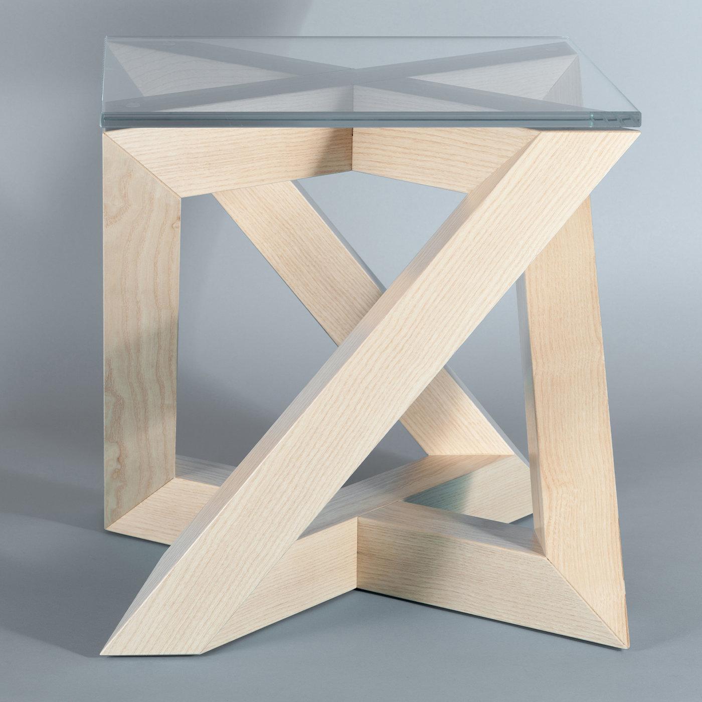 A highly geometrical and architectural work of art, this design by Antonio Saporito will make a singular statement in a contemporary home or contract area. A side table of strong visual impact, it rests on a wooden base defined by rigorous and