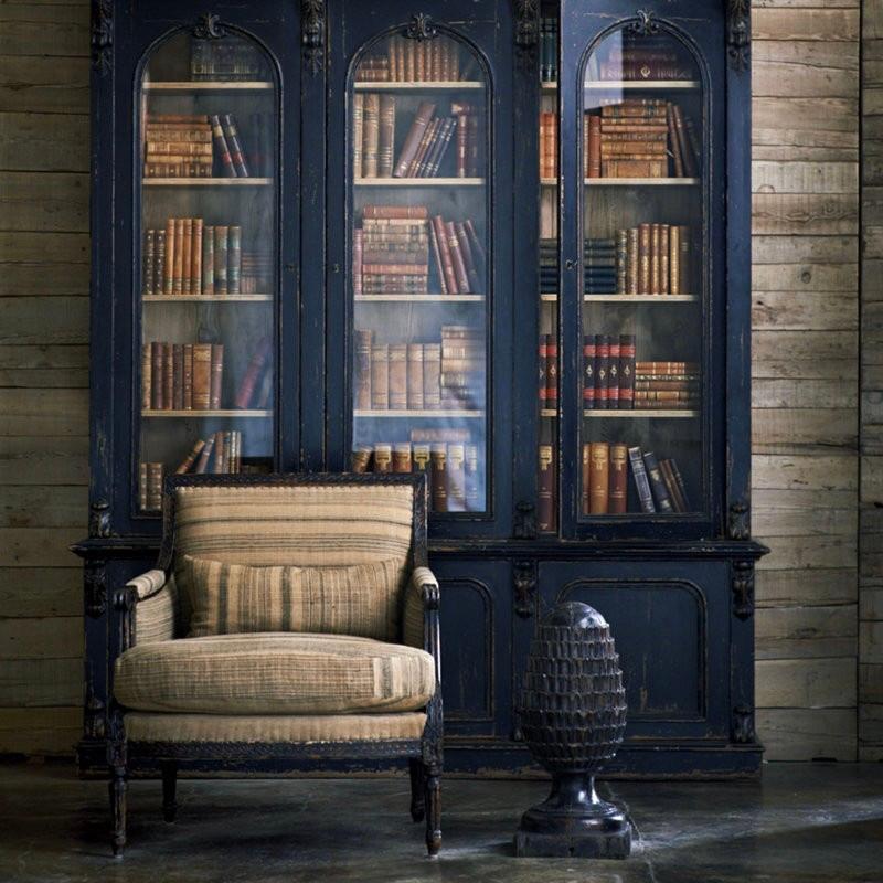 RL Victorian Renaissance Revival Ebonized Walnut bookcase cabinet, Van Thiel & Co. This Victorian Renaissance Revival bookcase is inspired by an English design from the 19th century. A stepped cornice protrudes over the three arched-glass-fronted