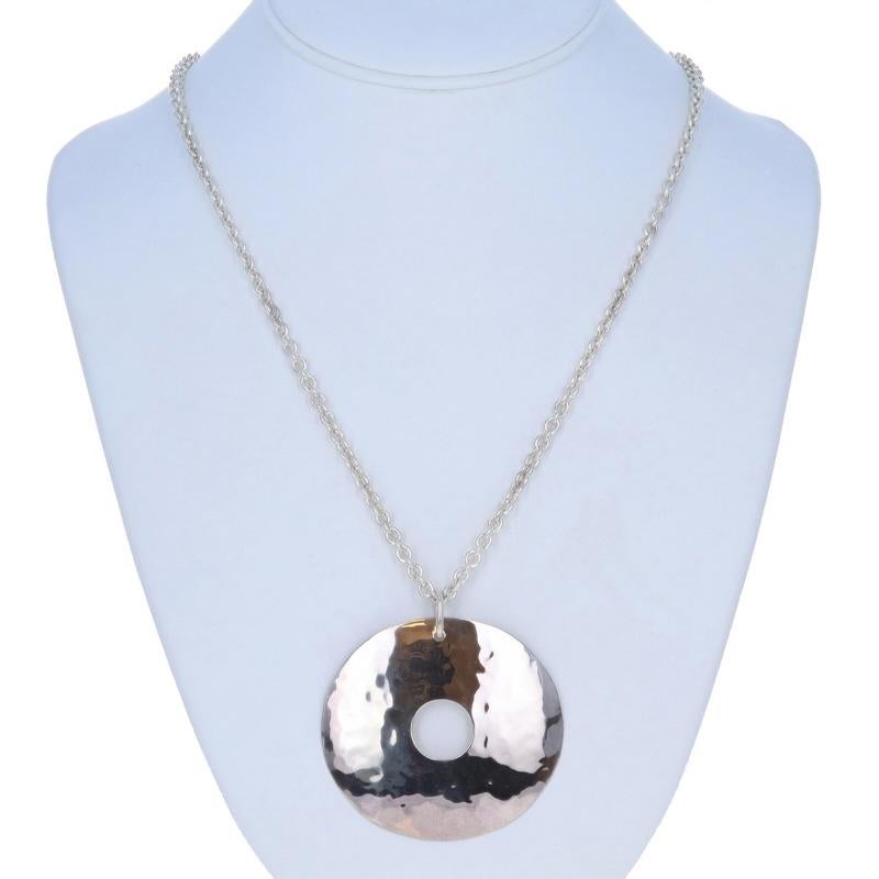 Brand: RLM Studio

Metal Content: Sterling Silver

Chain Style: Cable
Necklace Style: Chain
Fastening Type: Lobster Claw Clasp
Theme: Circular Disk, Cut Out
Features: Hammered

Measurements

Item 1: Pendant
Tall (from extended bail): 2 3/8