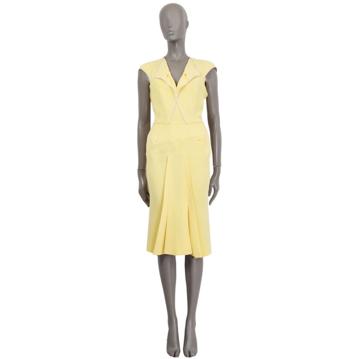 100% authentic Roland Mouret 'Montparnasse' midi dress in lemon and pale rose silk (50%) and wool (50%) with a deep v-neck and pockets. Closes in the back with a zipper. Partially lined in silk (100%). Has been worn and is in excellent condition.