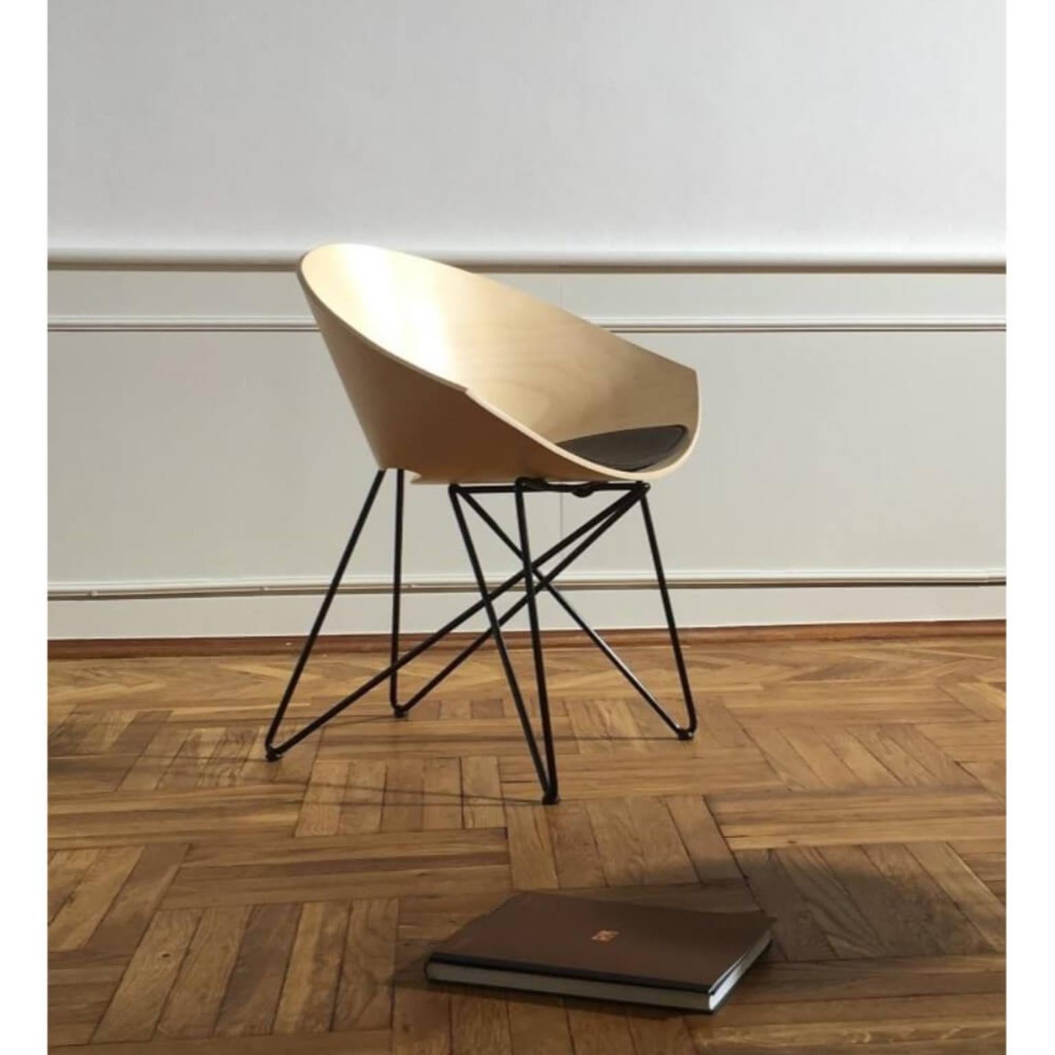 RM56 Beech Plywood Seat And Powder-Coated Black Steel Legs Armchair by VZOR
Dimensions: D 68 x W 67 x H 72 cm. SH: 38 cm.
Materials: Beech plywood and powder-coated steel. 

RM56 (plywood) is the trade name of a chair from the collection of