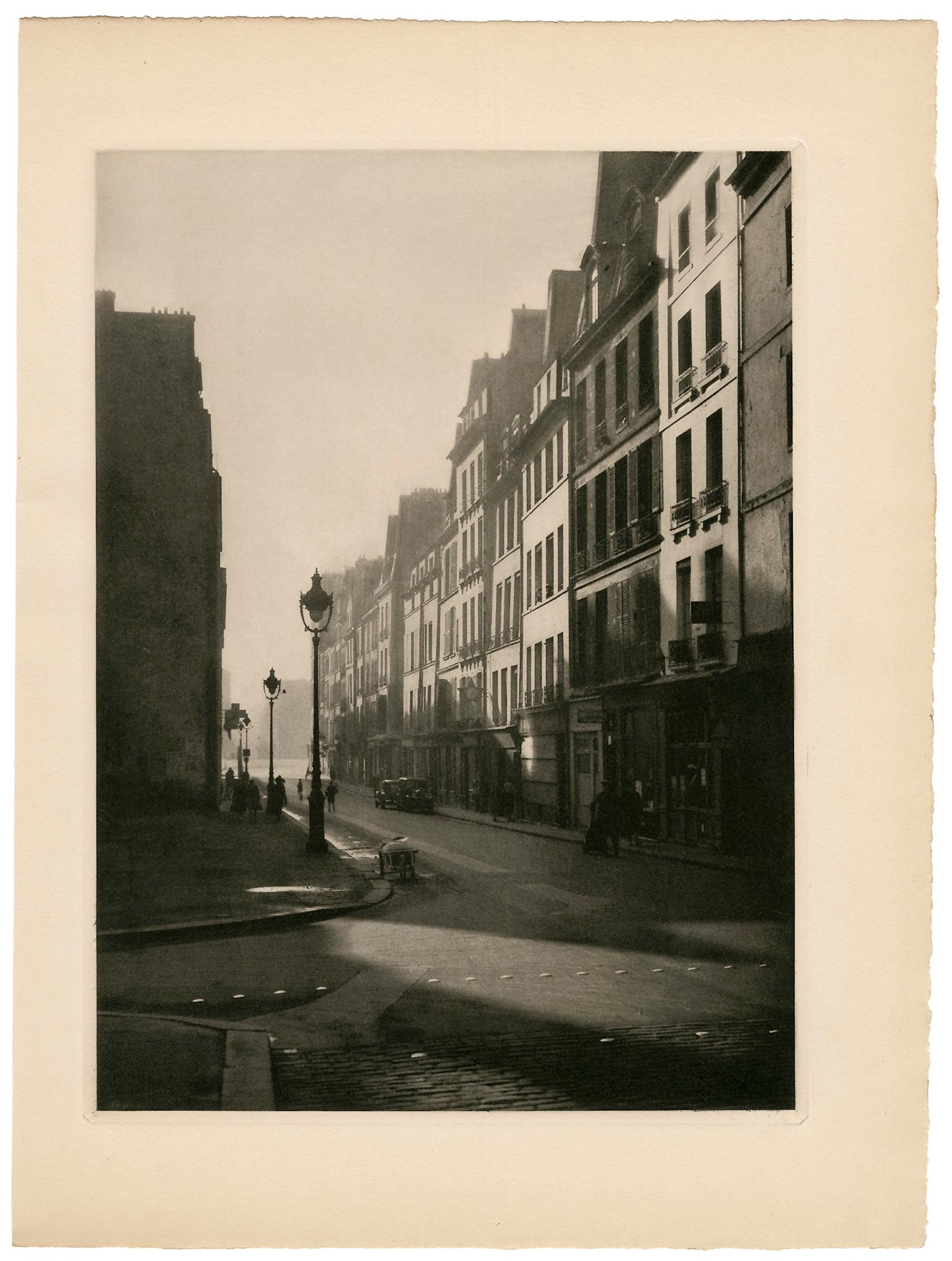 Street Scene, L'Ile Saint Louis, Paris — Mid-Century Photogravure - Photograph by Rémy Duval