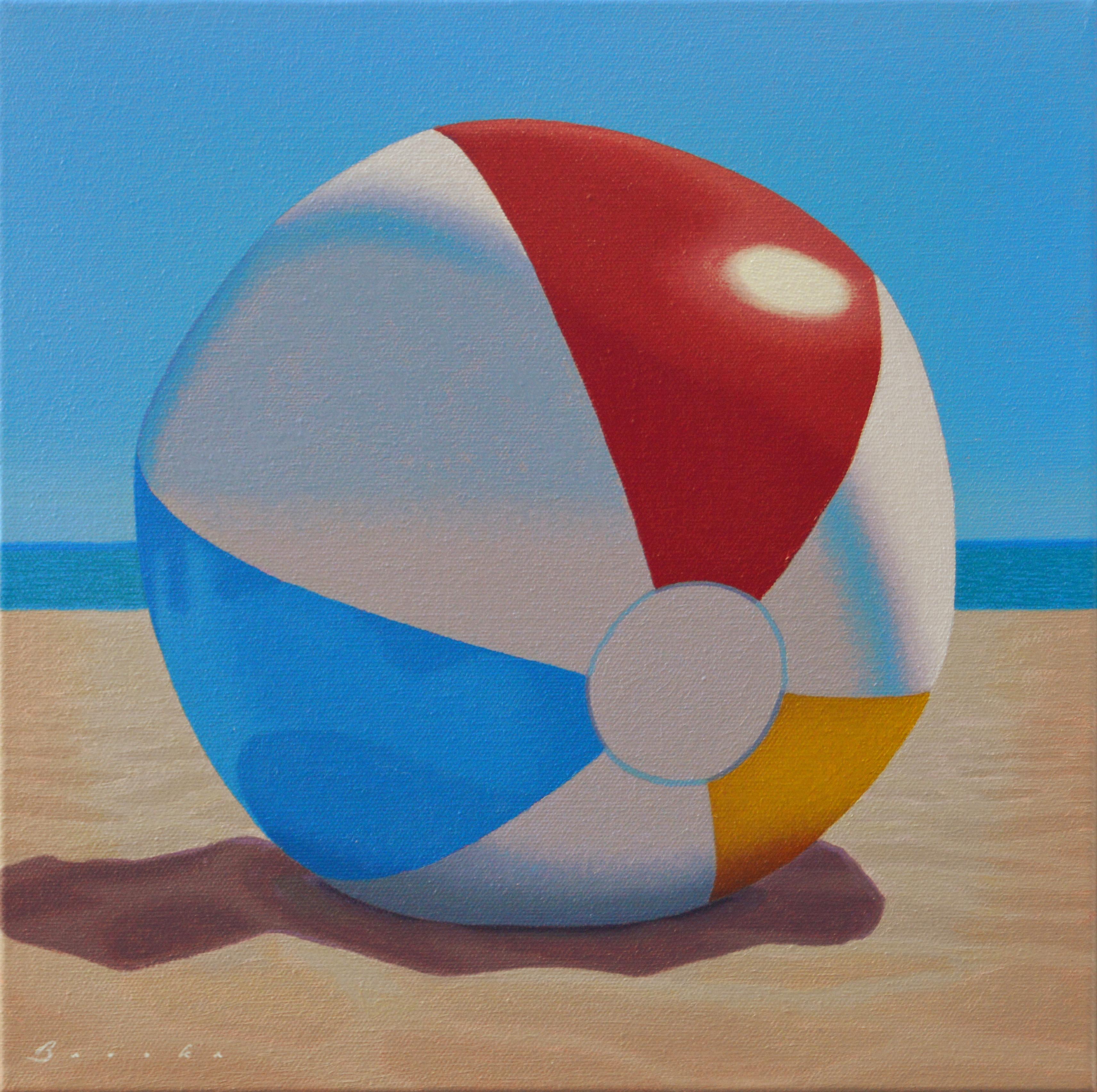 Rob Brooks Still-Life Painting - "Beach Ball" oil painting of a beachball laying in the sand with blue sky behind