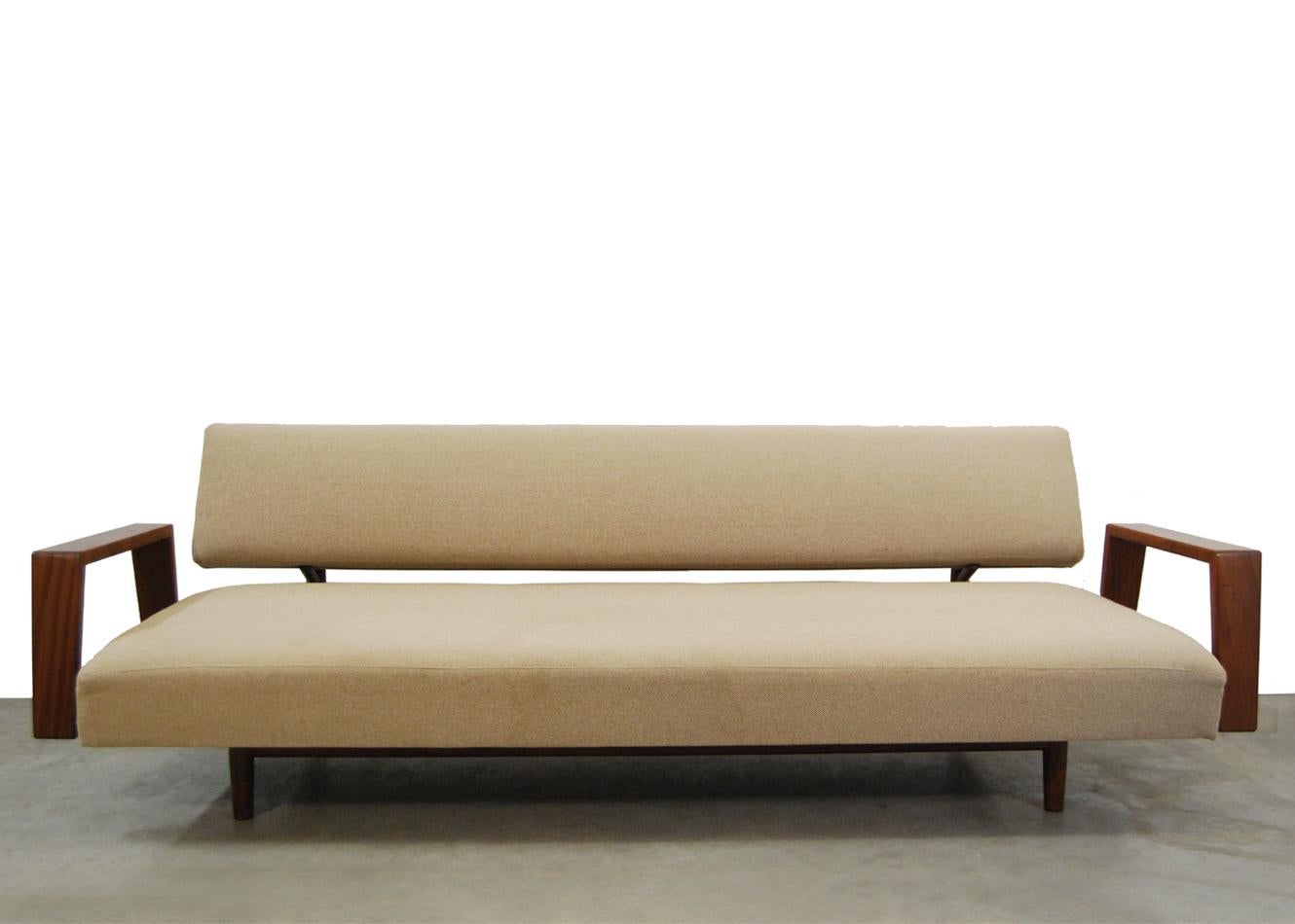 Rare 'Doublet' (daybed) sofa by Rob Parry for Gelderland designed in 1958. Teak frame and light brown fabric in good original condition. The sofa can be transformed into a daybed with a hand movement.
We can re-upholster the sofa if desired in