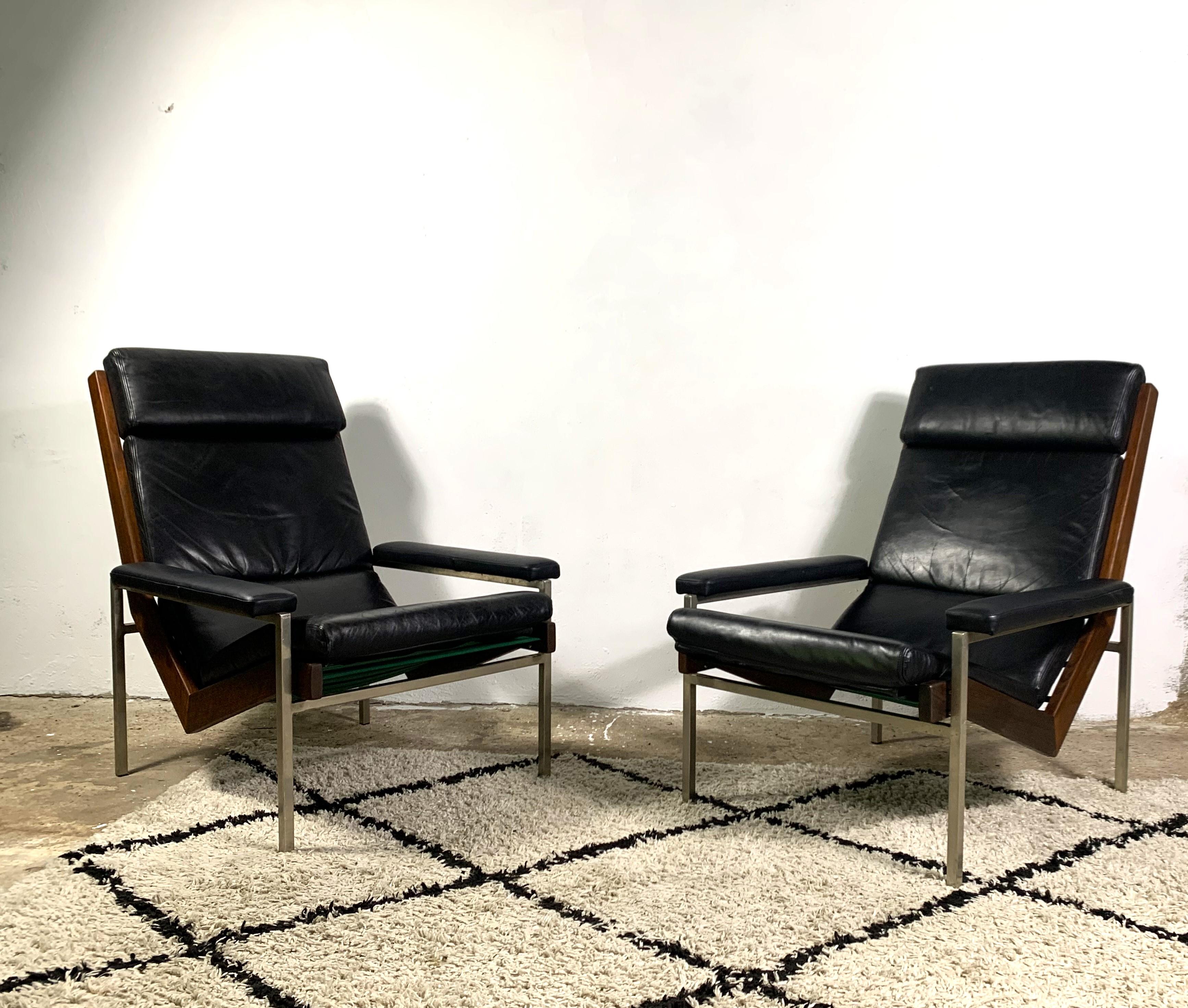Lotus armchairs designed by Rob Parry for Gelderland. Metal construction and unique rosewood frame make the harmonious picture with the ergonomic black leather seat. Iconic design of one of the best Dutch classic designers.