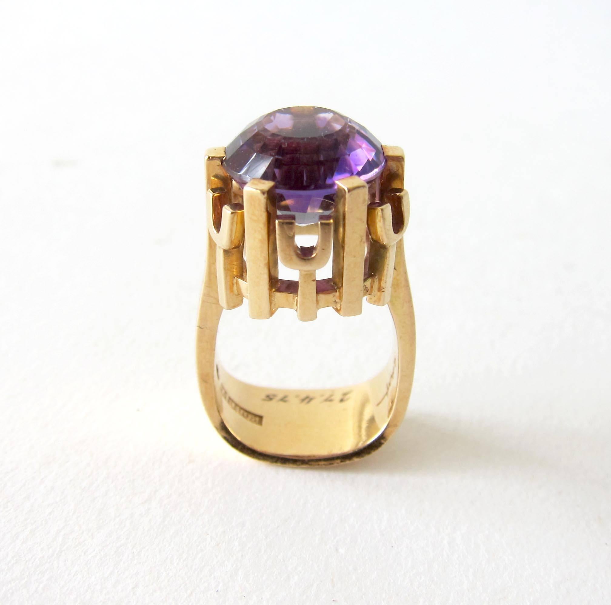 Rare, faceted eight carat amethyst in 18k gold crown like setting created by Robbert of Sweden.  Ring is a finger size 6 and is signed Robbert, Z9 (1974), Triple crown and inscribed 27-4-75. In very good vintage condition.   16.5 grams.