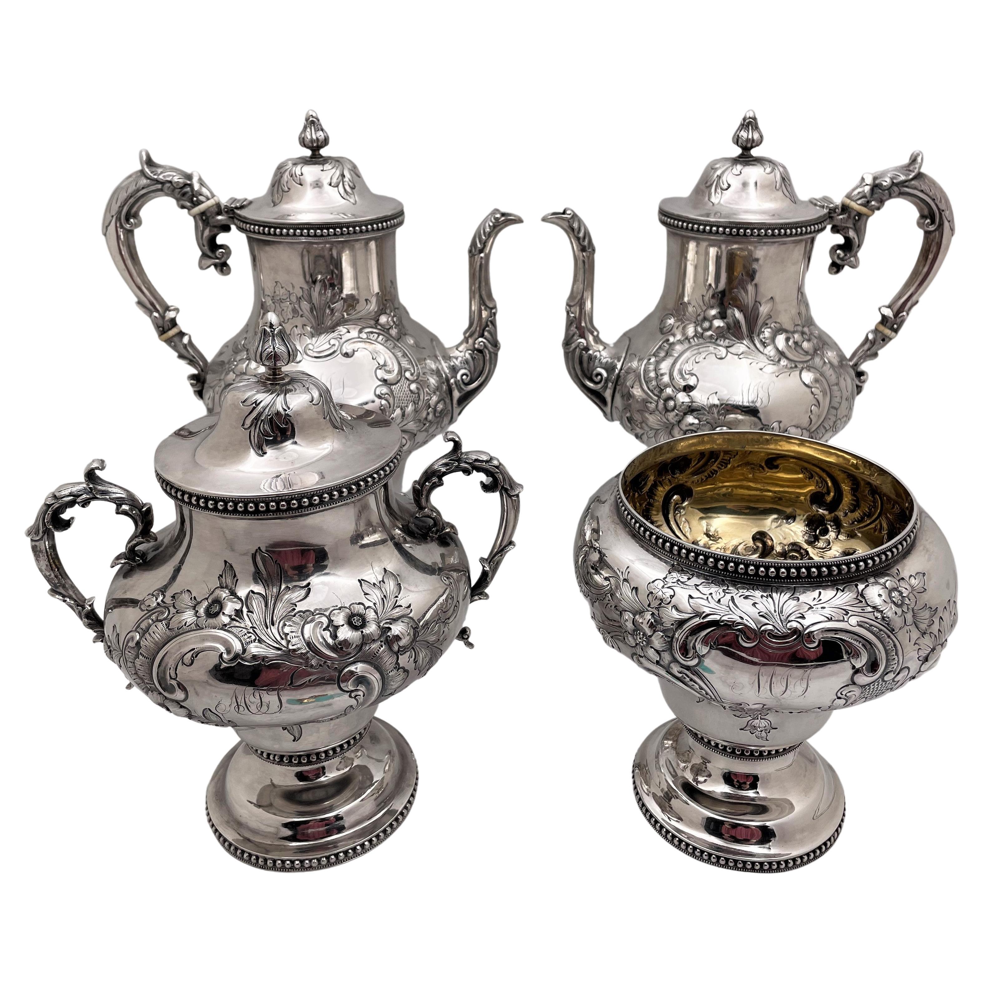 Robbins, Clark & Biddle Sterling Silver 19th Century 4-Piece Repousse Tea Set For Sale