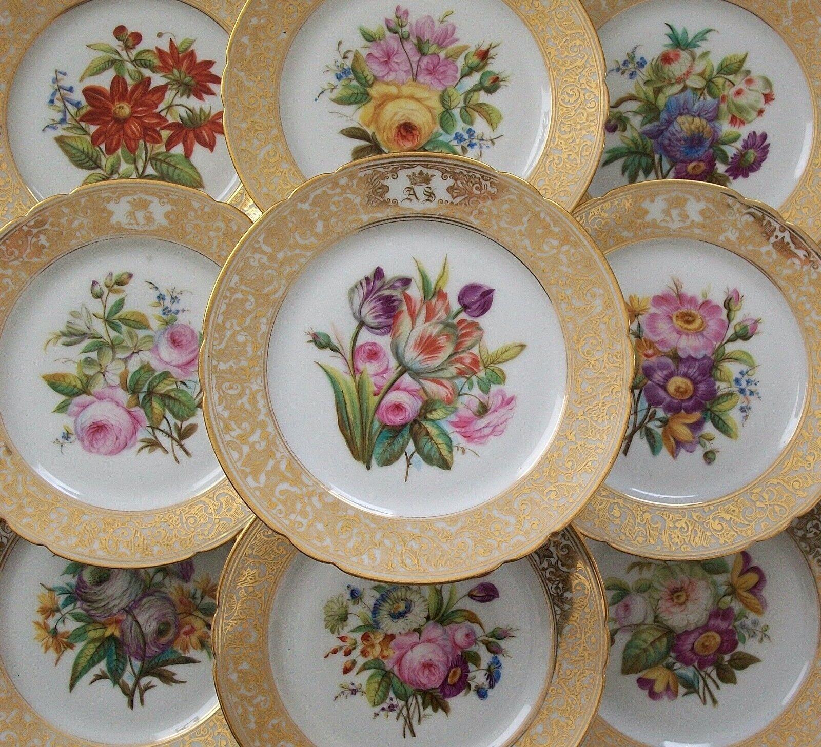 Robert À Paris - Fine quality Paris Porcelain hand painted cabinet plates - total of nine (9) plates - each plate features a unique floral center - elaborate gilded borders with royal monogram to each - eight plates signed in red script on the back