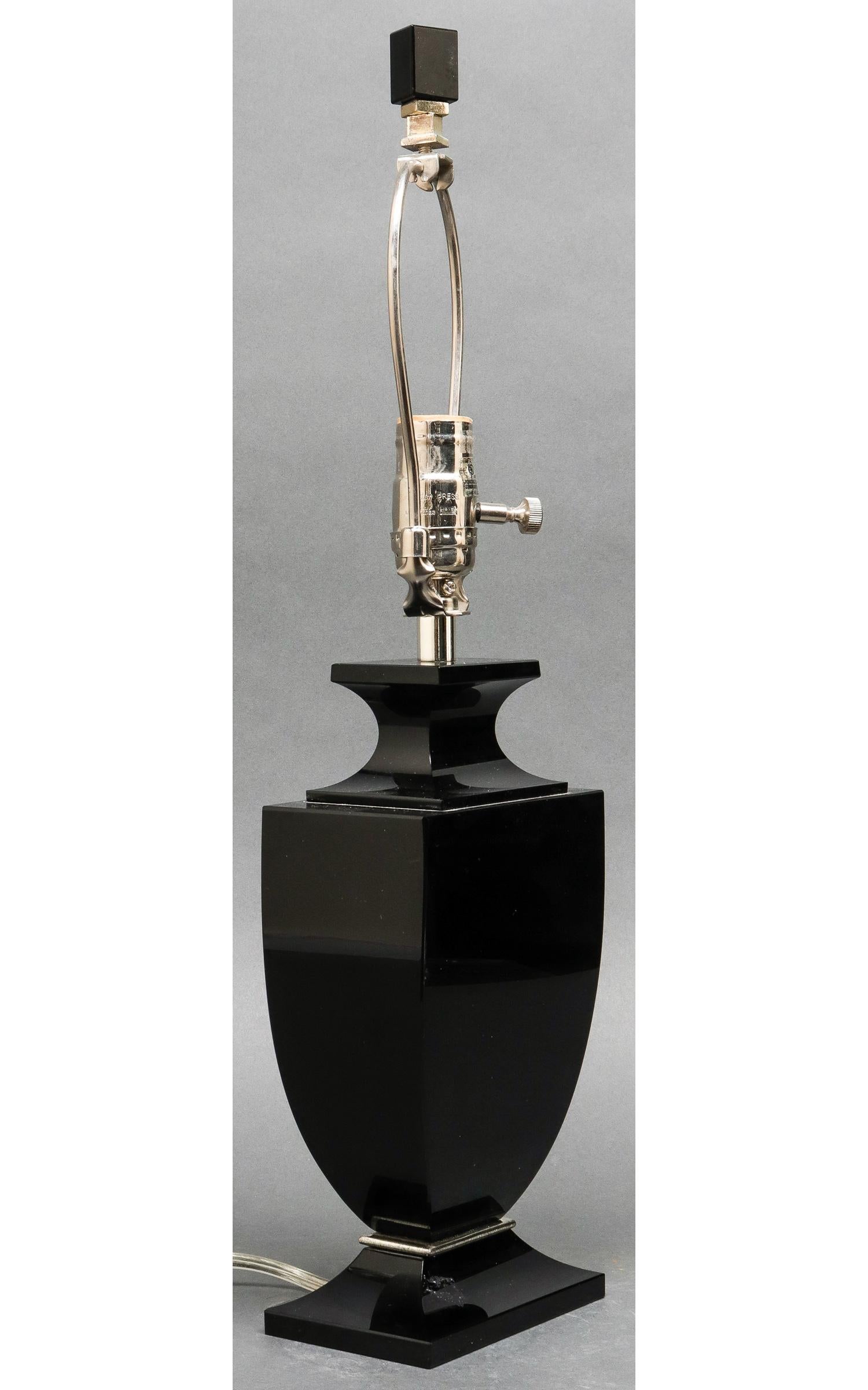 Robert Abbey Inc. Modern cut black glass lamp, in stylized urn form, with chrome accents, marked to hardware, 