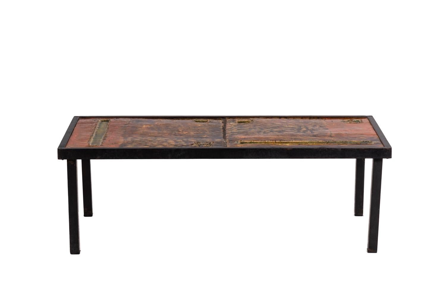 Robert and Jean Cloutier, coffee table in ceramic and metal, 1950s
2900,00€

Robert et Jean Cloutier, realized by. 
Coffee table. Lava tray. Base in black lacquered metal.

Work realized in the 1950s.

Dimensions : H 35 x W 105 x D 53