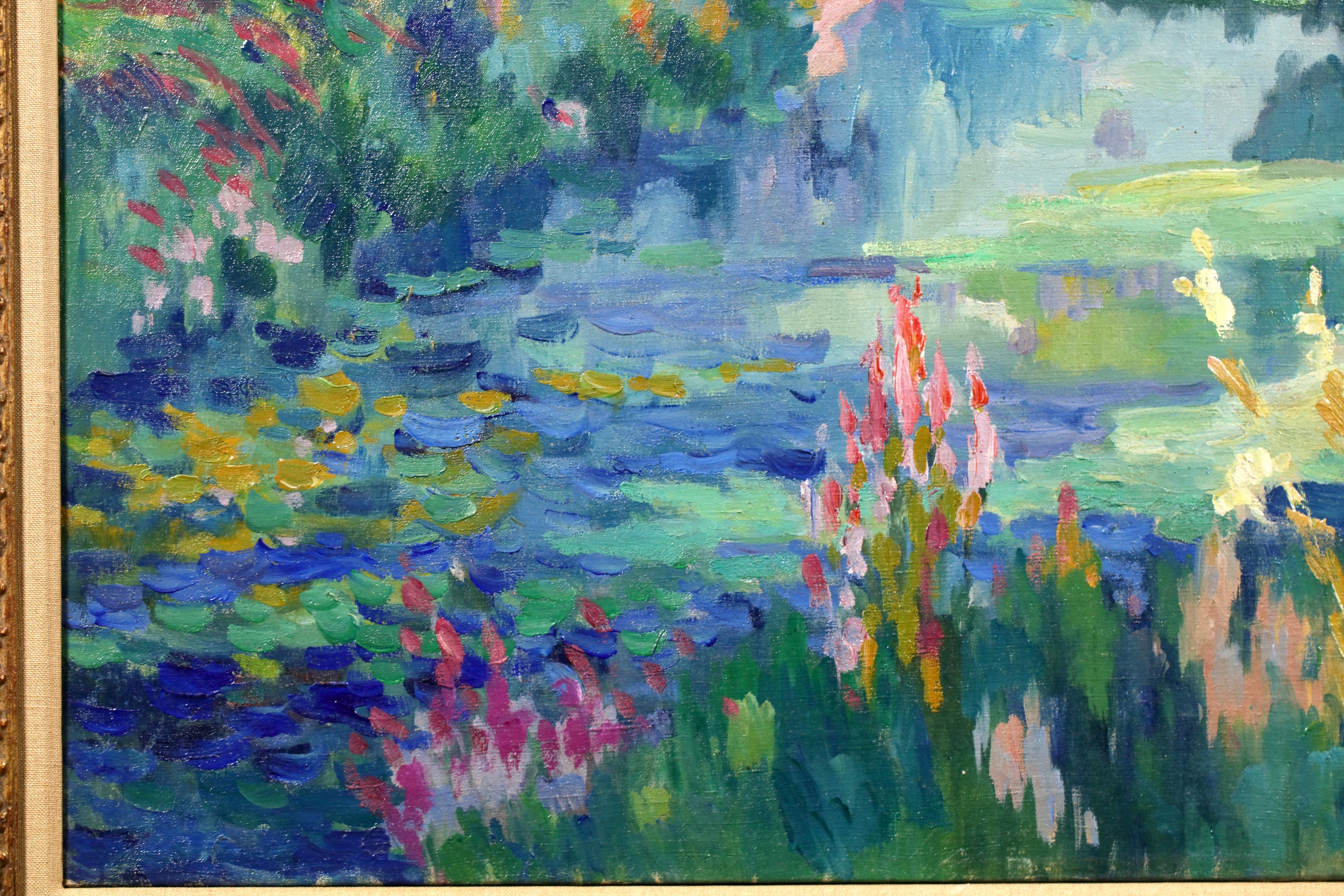 Paesaggio fluviale fauvista su tela firmato nel 1920 circa dal pittore francese post impressionista Robert Antoine Pinchon. L'opera raffigura una veduta di un fiume che si snoda tra campi di fiori selvatici in un bellissimo e luminoso paesaggio