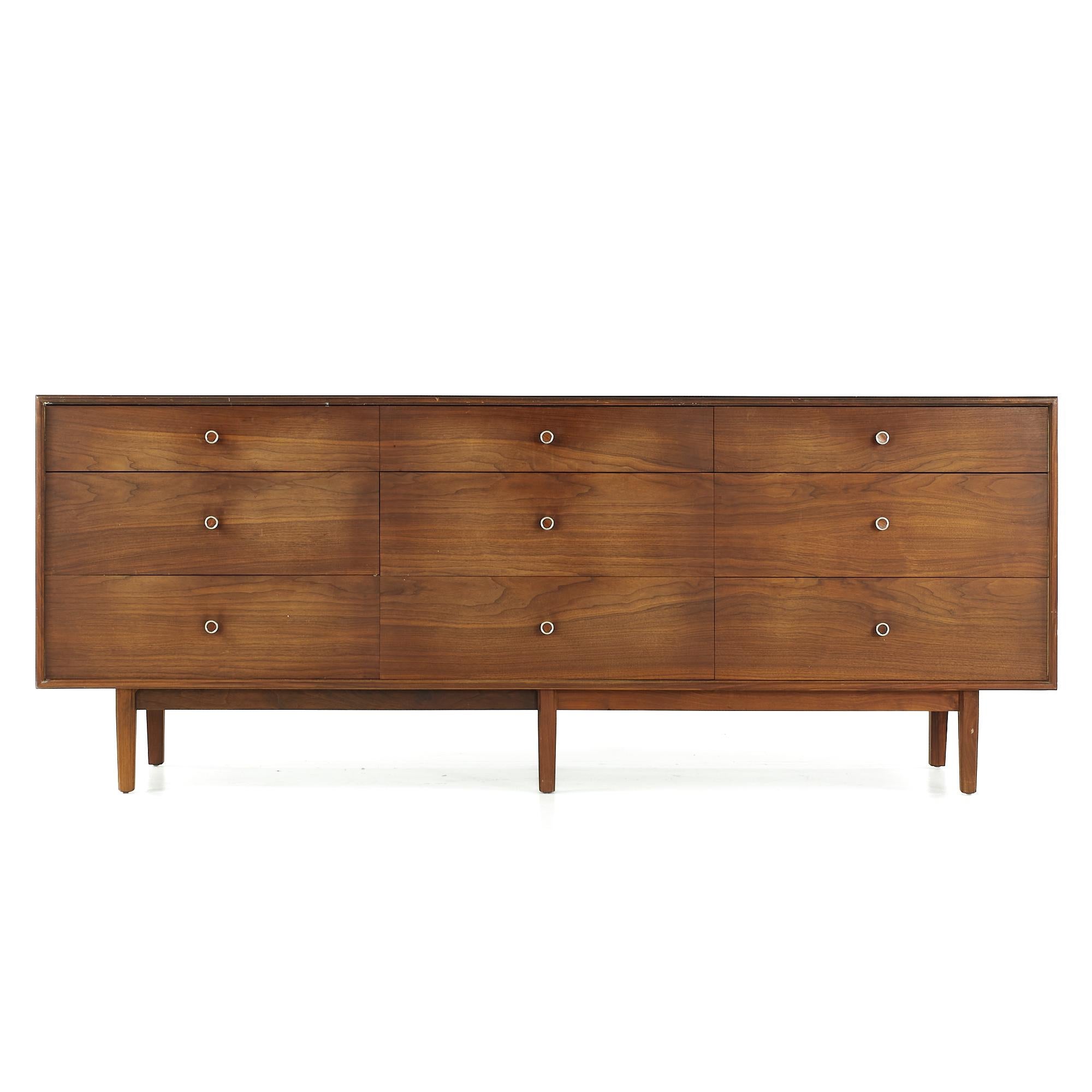 Robert Baron for Glenn of California midcentury walnut lowboy dresser.

This lowboy measures: 78 wide x 18 deep x 30.5 inches high

All pieces of furniture can be had in what we call restored vintage condition. That means the piece is restored