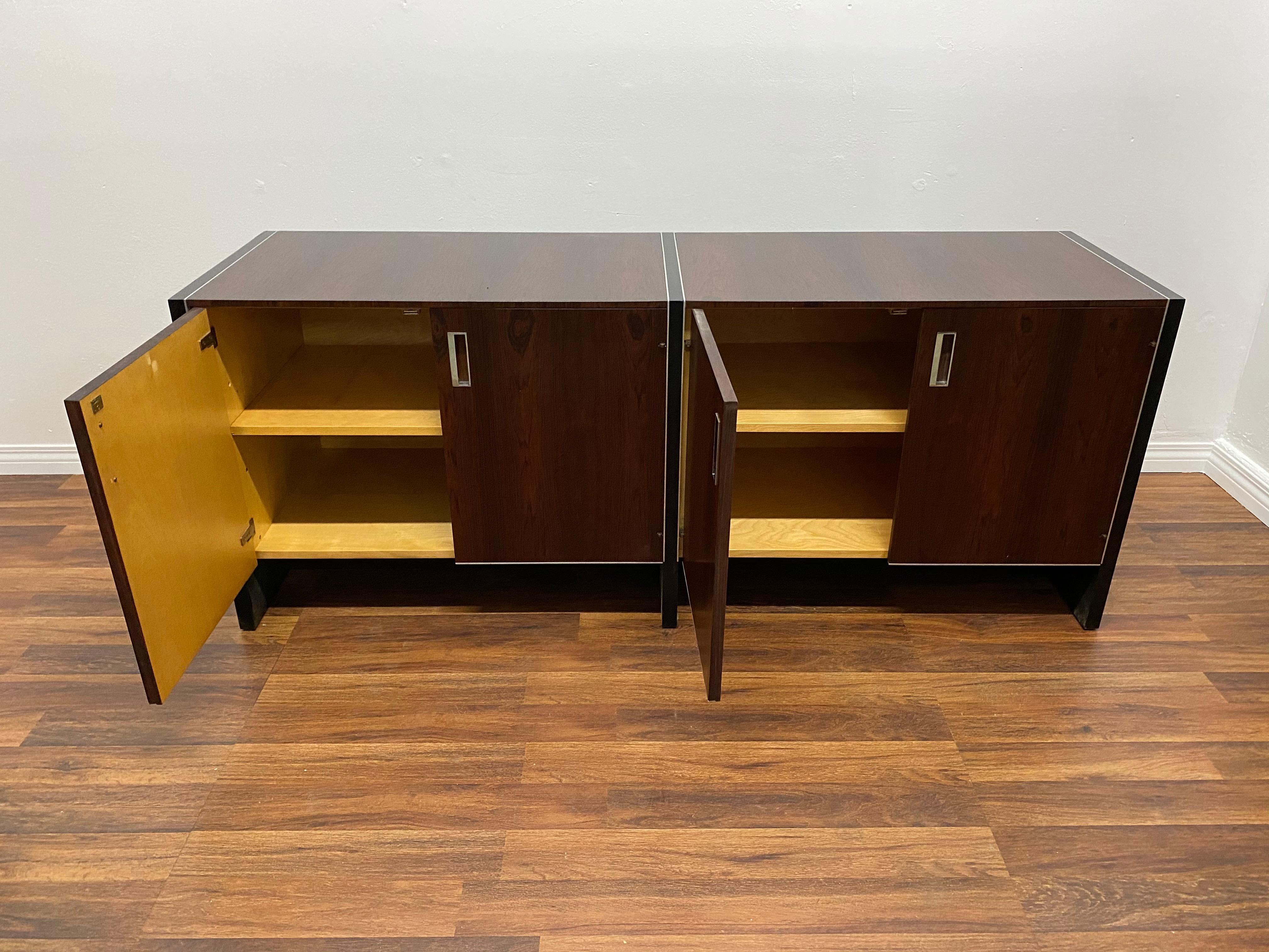 An exquisite Robert Baron for Glenn of California rosewood sideboard credenza, 1970. Ebonized oak side panels. Highly figured Brazilian rosewood doors with inset chrome handles and trim. Maple interior with adjustable shelfs. In great condition.

 