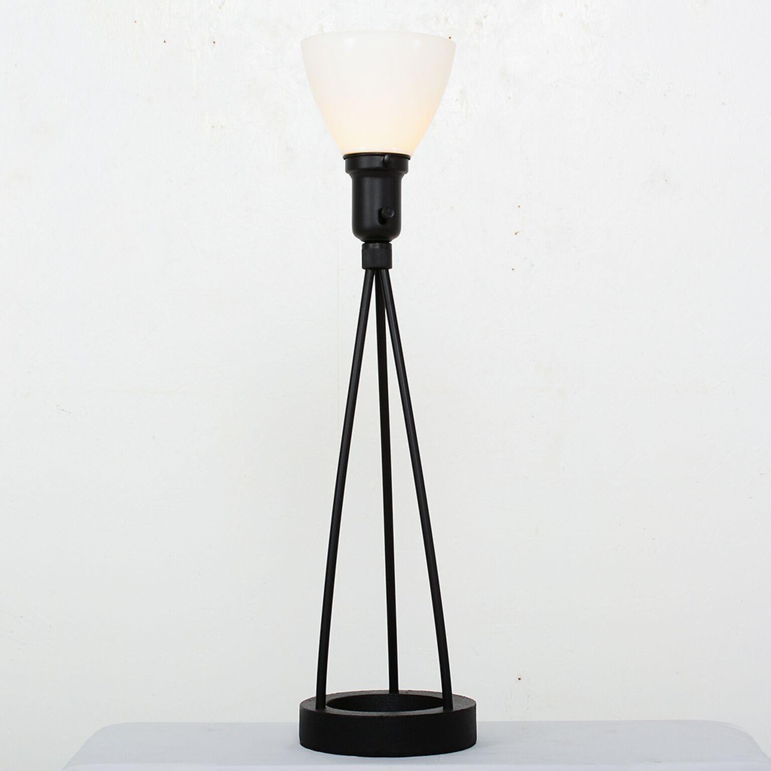 For your pleasure: Tripod metal table lamp with glass shade by Robert Bulmore for Lightolier, circa 1960s.
Dimensions: Height 27