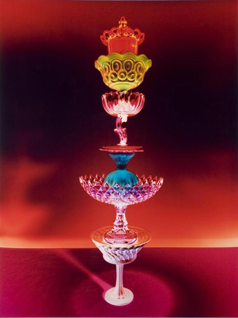 Untitled - Red jewel tone antique glass still life tower, chromogenic print - Contemporary Photograph by Robert Calafiore