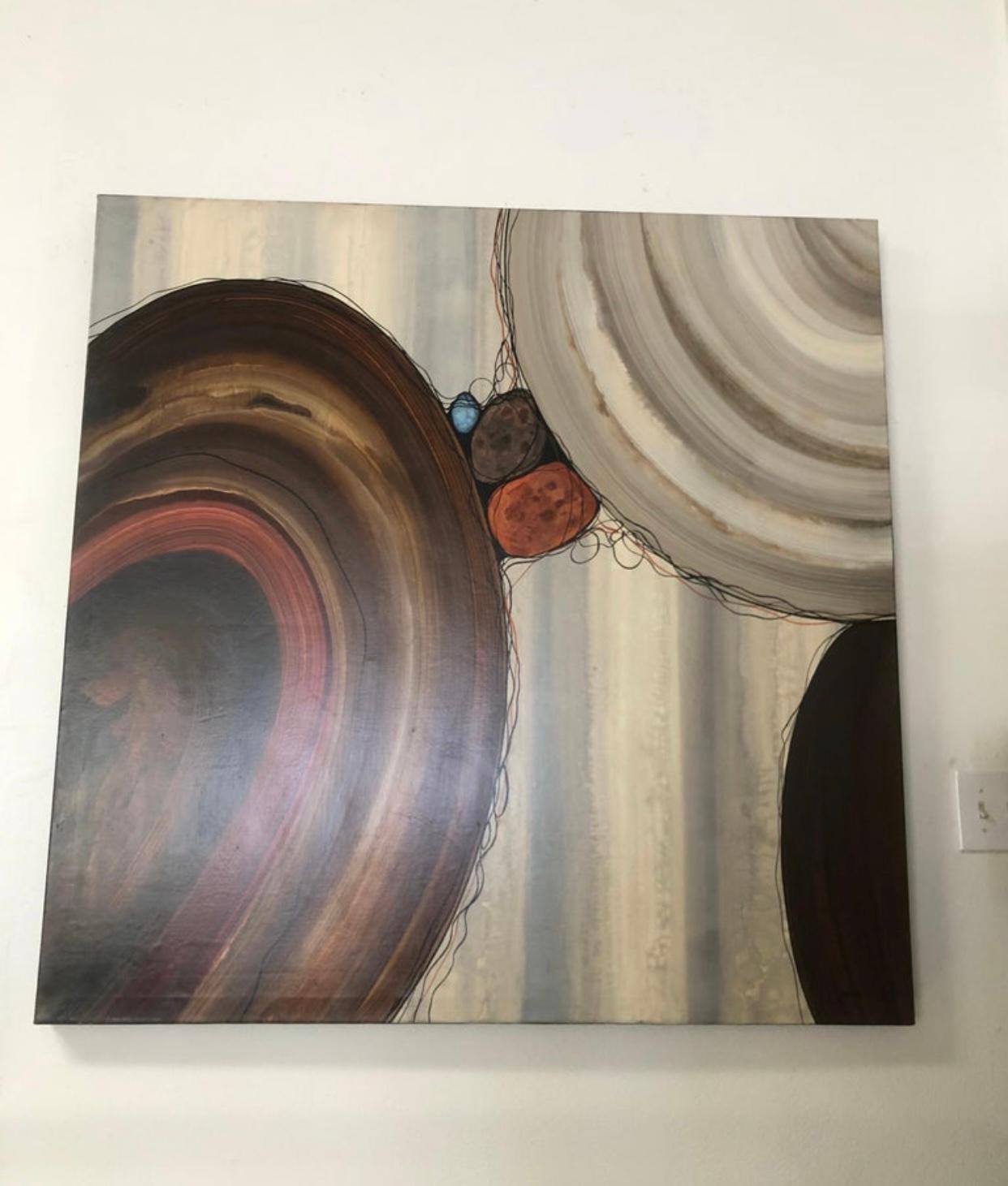 Robert Charon is a listed artist known for his modern abstracts. His series “Orbs” was extremely popular and a few images were produced in prints sold worldwide. This large 49 x 49 painting is original on canvas. Beautiful modern browns with a