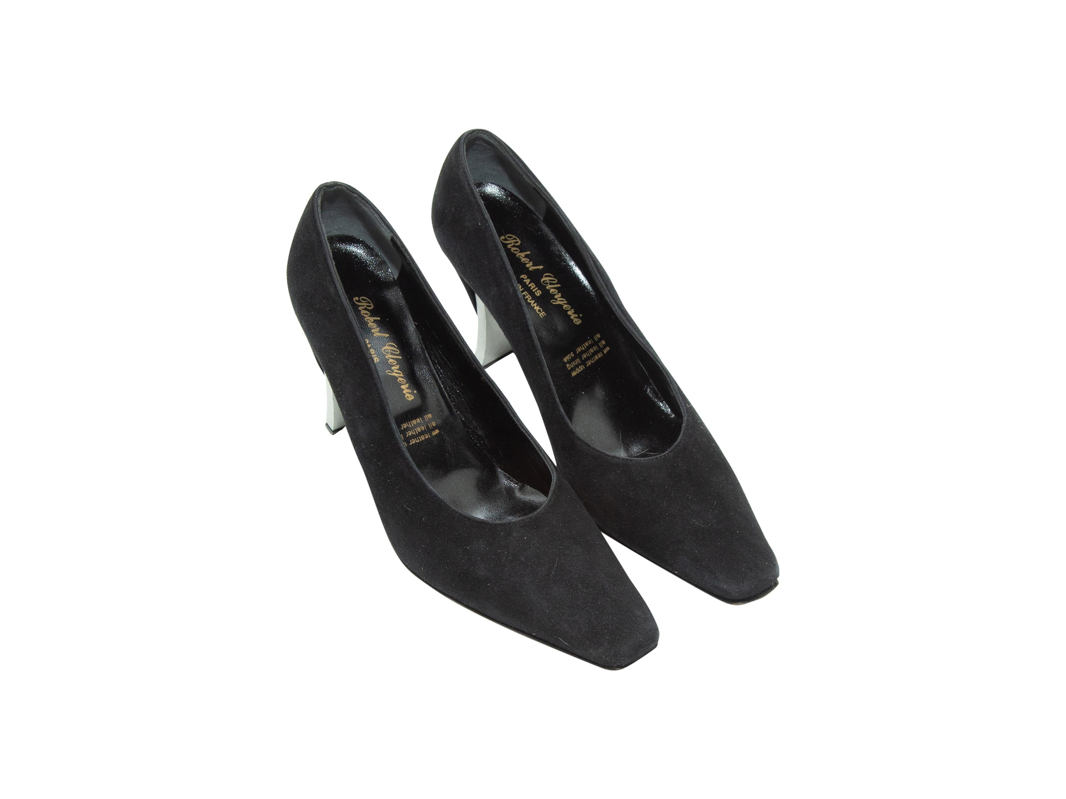 Product details: Black suede pointed-toe pumped by Robert Clergerie. Slip-on style. Silver curved heels. 3