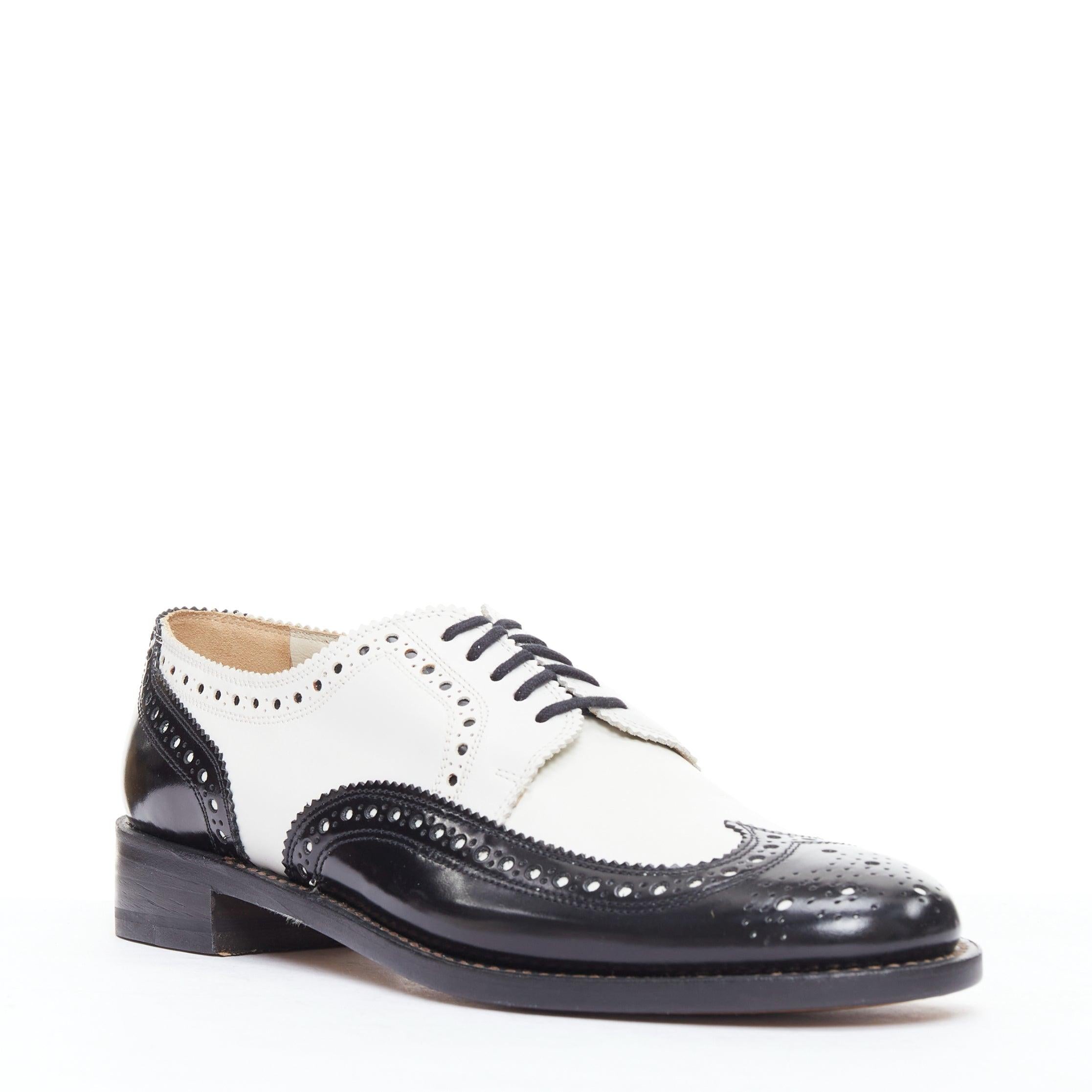 ROBERT CLERGERIE black white leather bicolor derby brogue UK7 EU40
Reference: NKLL/A00355
Brand: Robert Clergerie
Material: Leather
Color: Black, White
Pattern: Solid
Closure: Lace Up
Lining: Nude Leather
Made in: France

CONDITION:
Condition: Very
