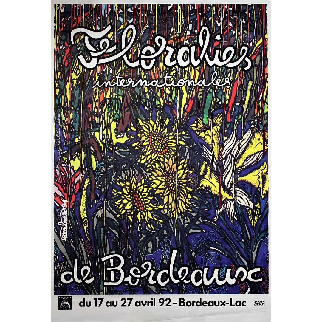 Cette affiche originale de 1992 de l
artiste français Robert Combas a été créée pour les Floralies Internationales de Bordeaux, une grande célébration de l
horticulture qui s
est tenue à Bordeaux-Lac. Émeute de couleurs et de lignes, Combas