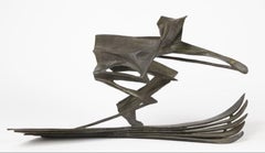 Escultura de bronce de un esquiador