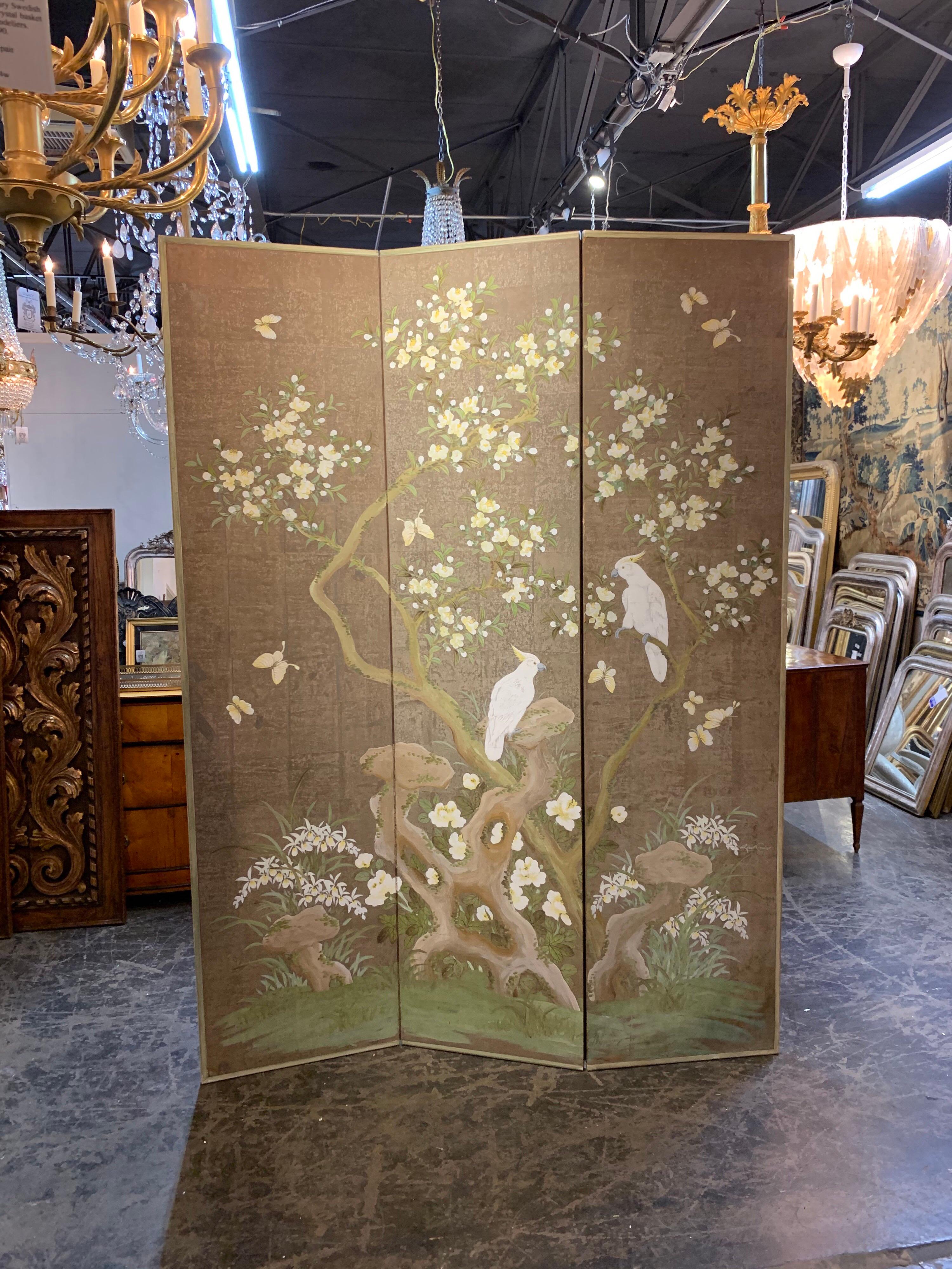 Splendid hand painted 3 panel screen by artist Robert Crowder. Beautiful images of flowers, birds and butterflies. Truly adds interest a fine home. So pretty! Note: There is a small tear on one of the screens that could be repaired.