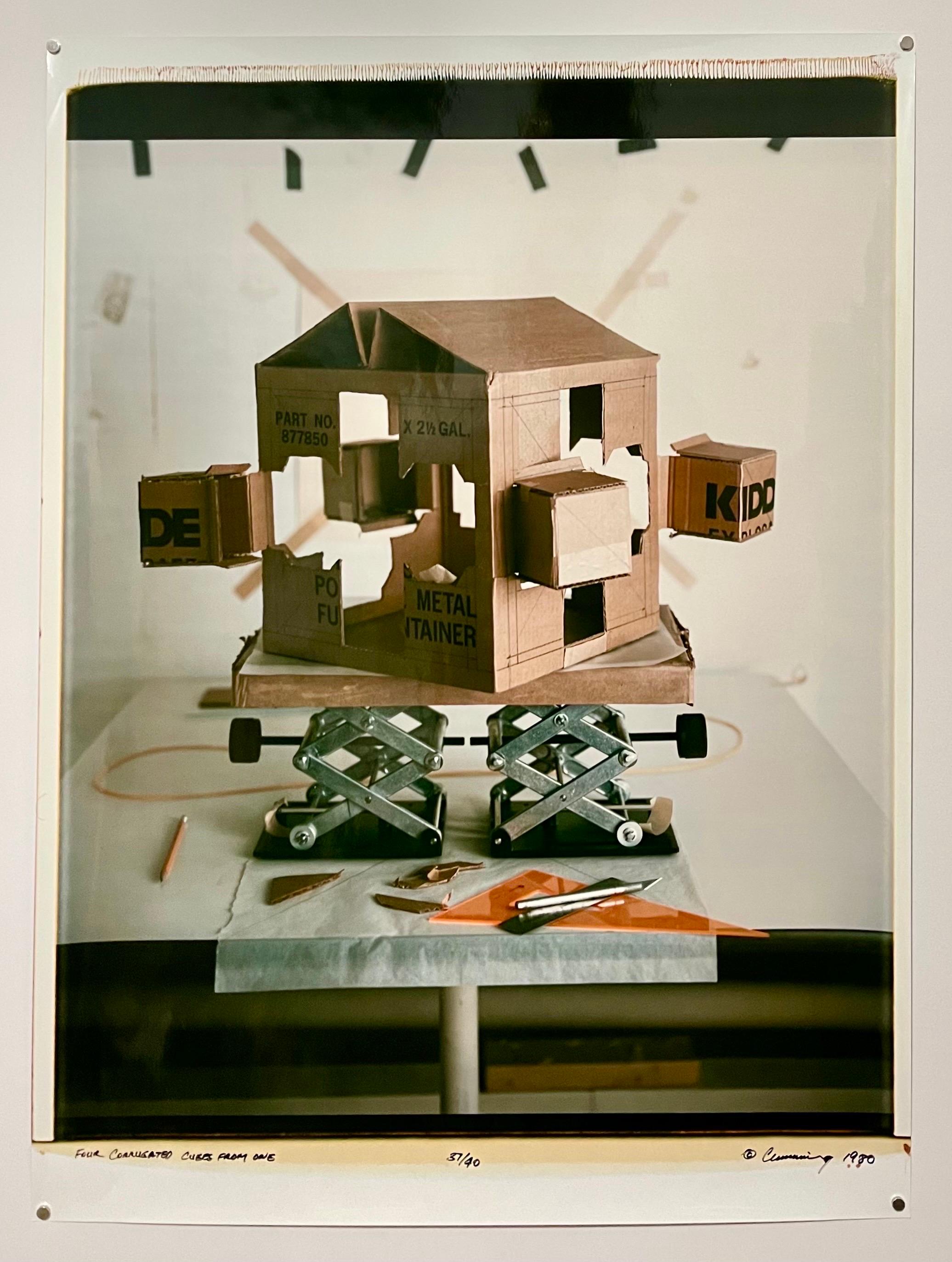 
Robert Cumming
Title: Four Corrugated Cubes from One
Date: 1980
Original Polaroid Large Format Print (Photo-Internal dye diffusion transfer)
Location:	Cambridge Massachusetts United States
Dimensions: Image: 27 1/2 x 20 1/2 in. (69.9 x 52.1 cm),