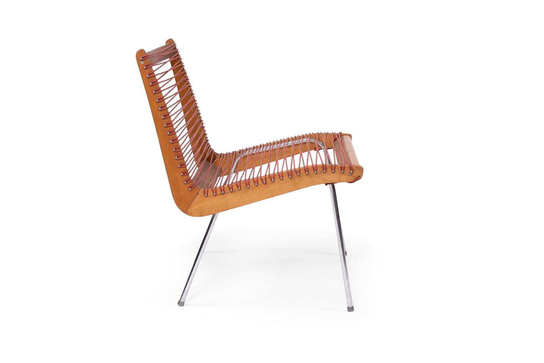 Robert J. Ellenberger for Calfab furniture Company, Los Angeles California. This design was selected for the MOMA good Design exhibition in 1950. The knock down side chair, solid hardwood frame strung with original red cording was shown next to a