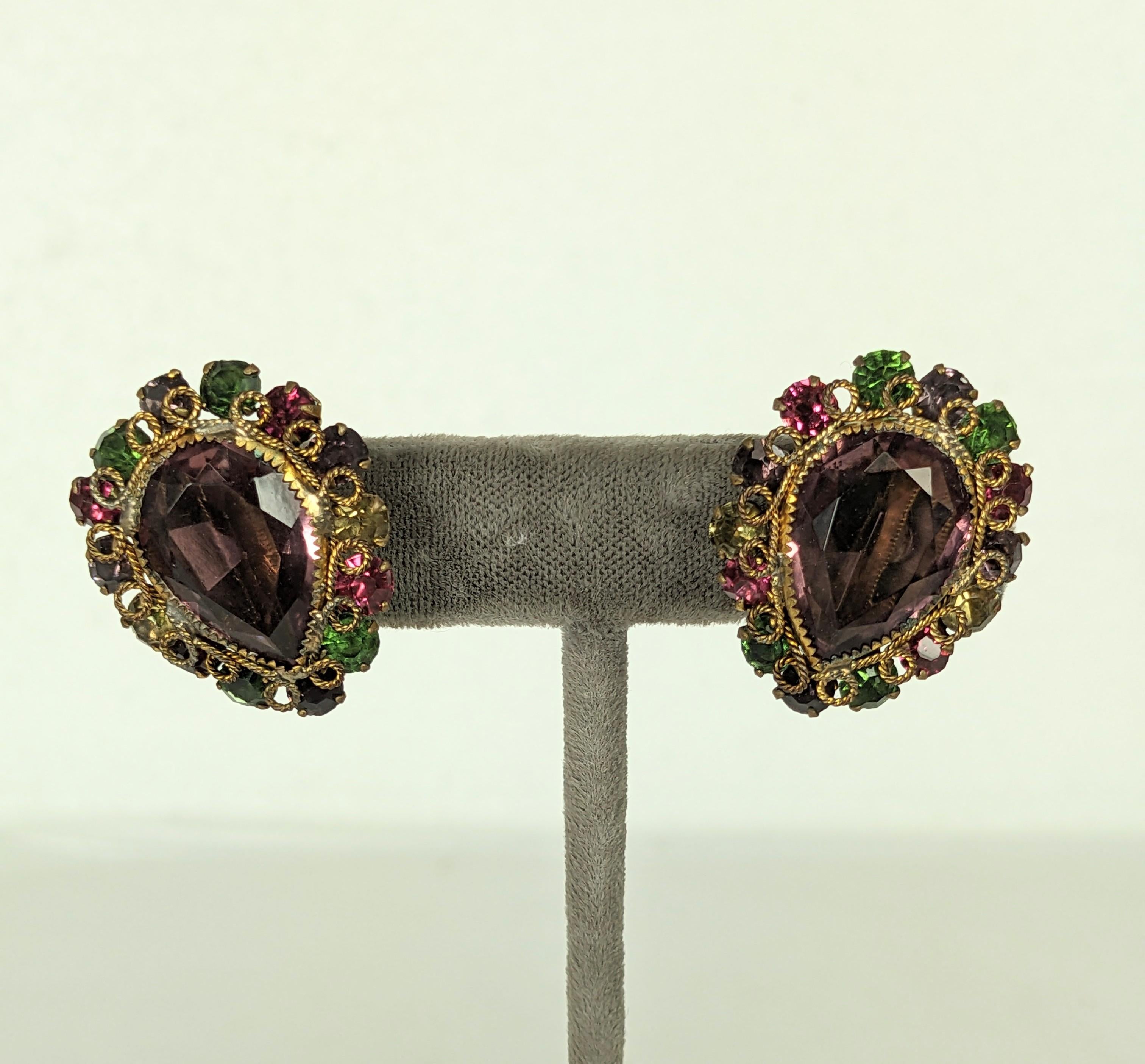 Robert Filigree Jeweled Earrings from the 1940's. Large pear shaped amythest crystal surrounded by multicolored pastes and signature Robert filigree wirework. Unsigned. 1