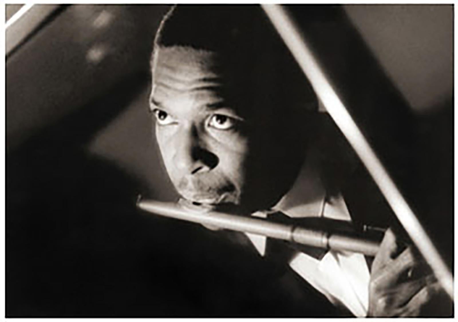 Robert Freeman Black and White Photograph - John Coltrane Playing Flute