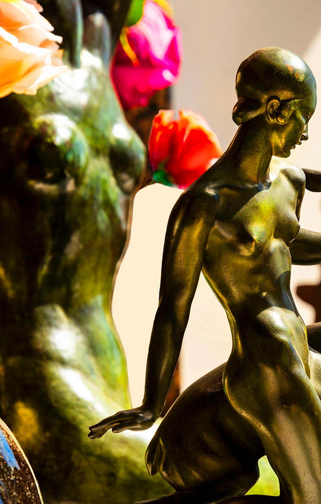Fawn at Dawn photograph.  Golden light pours into the scene and drenches a  classic bronze statue with flowers evoking a a timelessness. 
Signed, Dated, Numbered 3/15, lower right,  unframed, printed later, other sizes available, Printed on