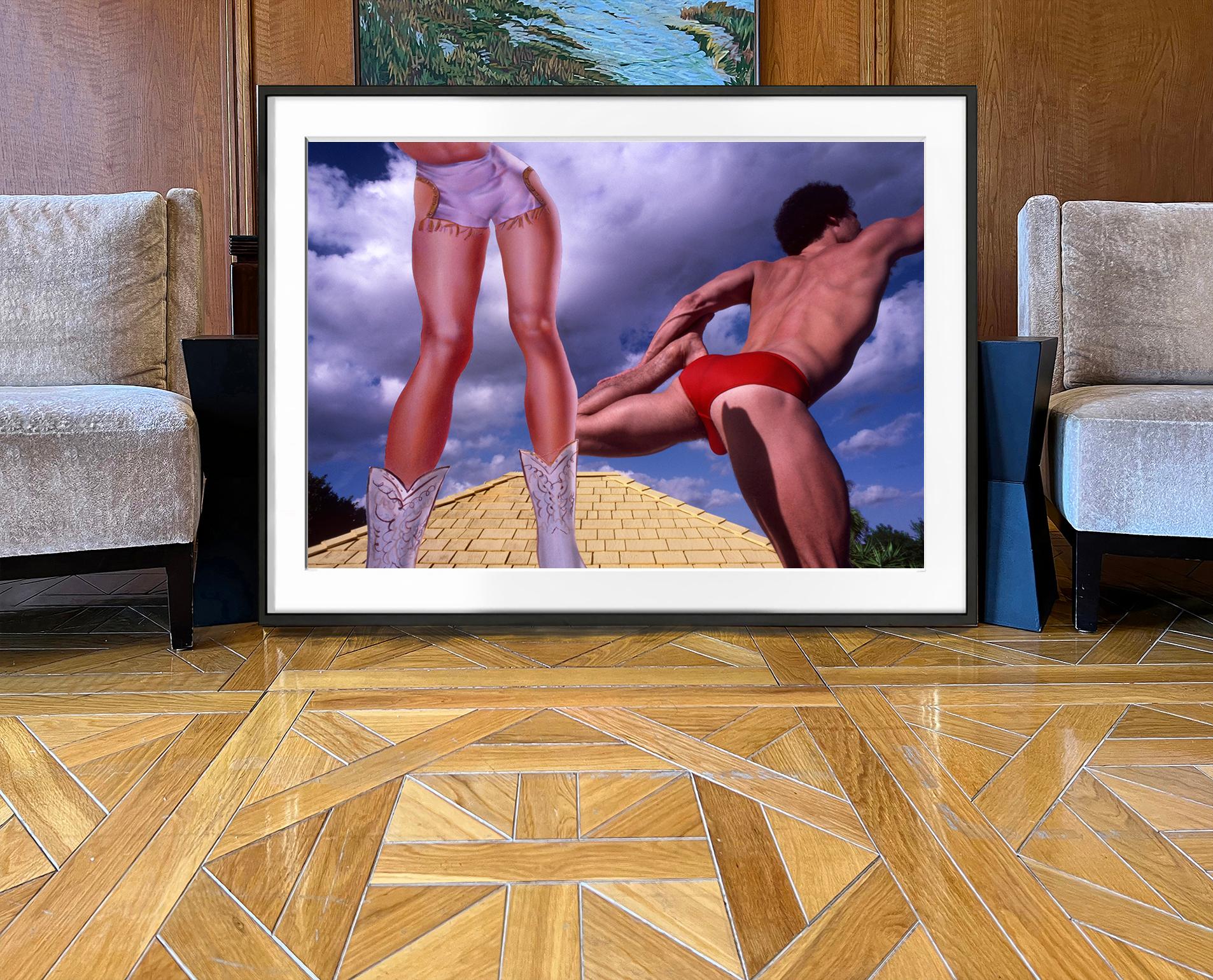 Muscular Male and  Leggy Female Figure on the Roof - Surrealist Photograph by Robert Funk