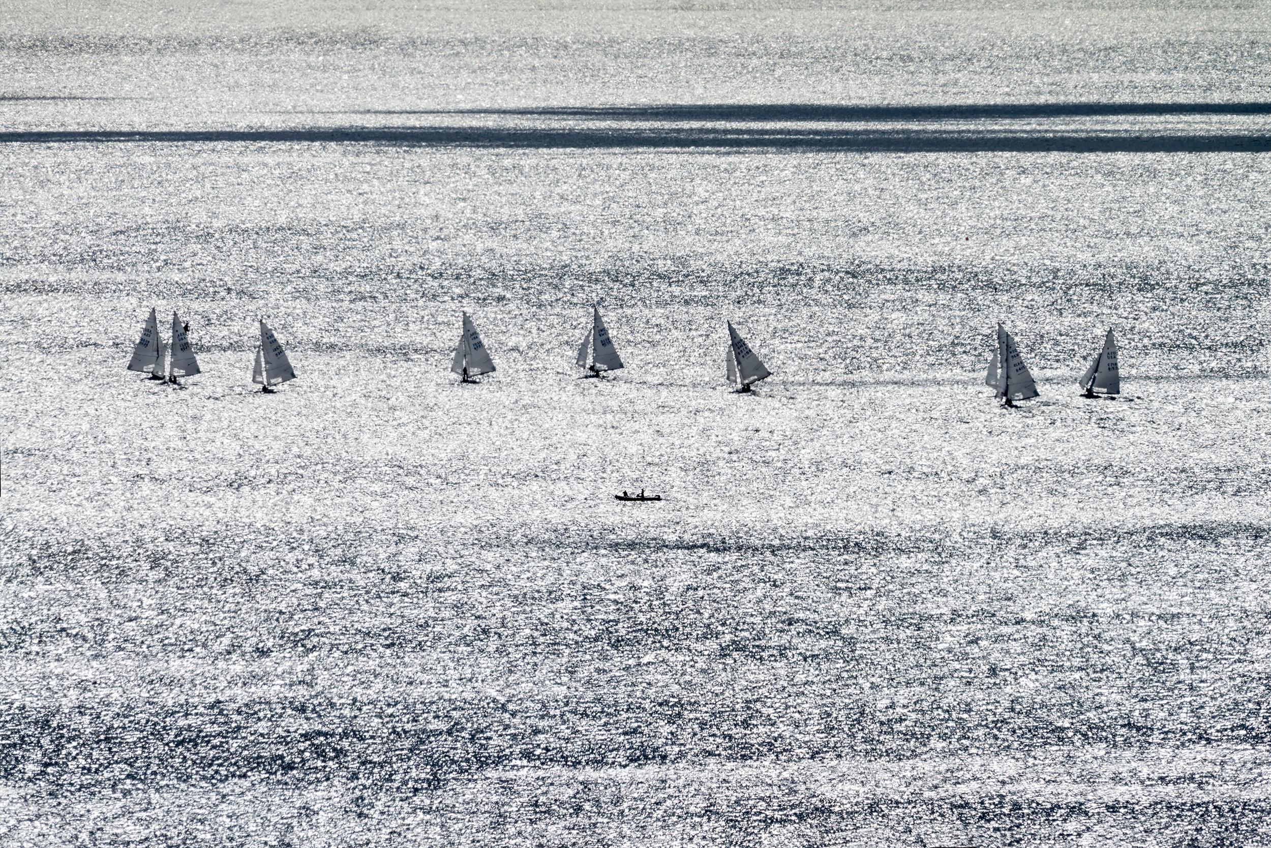 Sail Boats with Two Men in a Boat on a Silver Gray Sea, Monochromatic