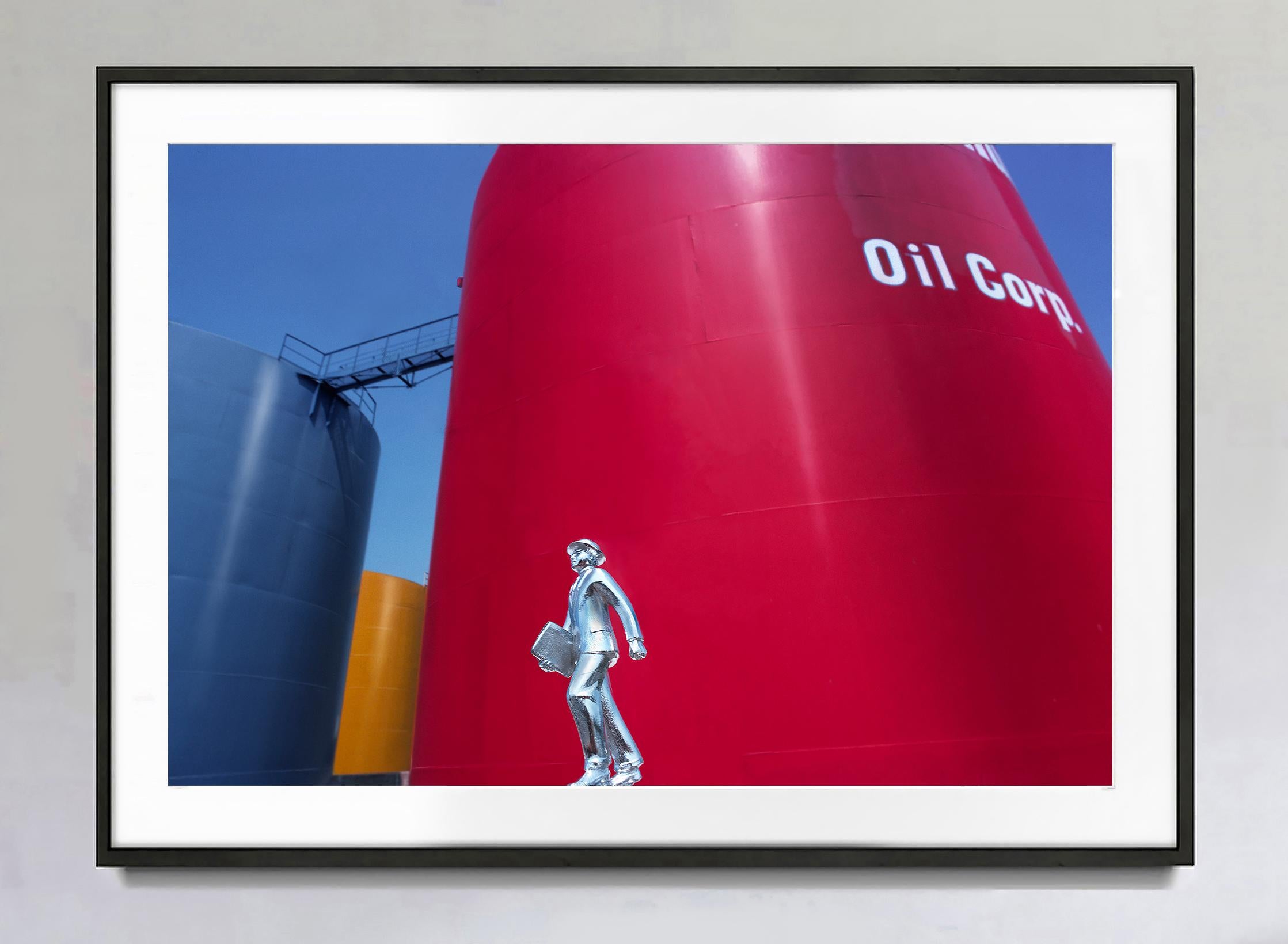 Silver Man and the Tank - Primary Colors,  Staged Photography - Red Abstract Photograph by Robert Funk