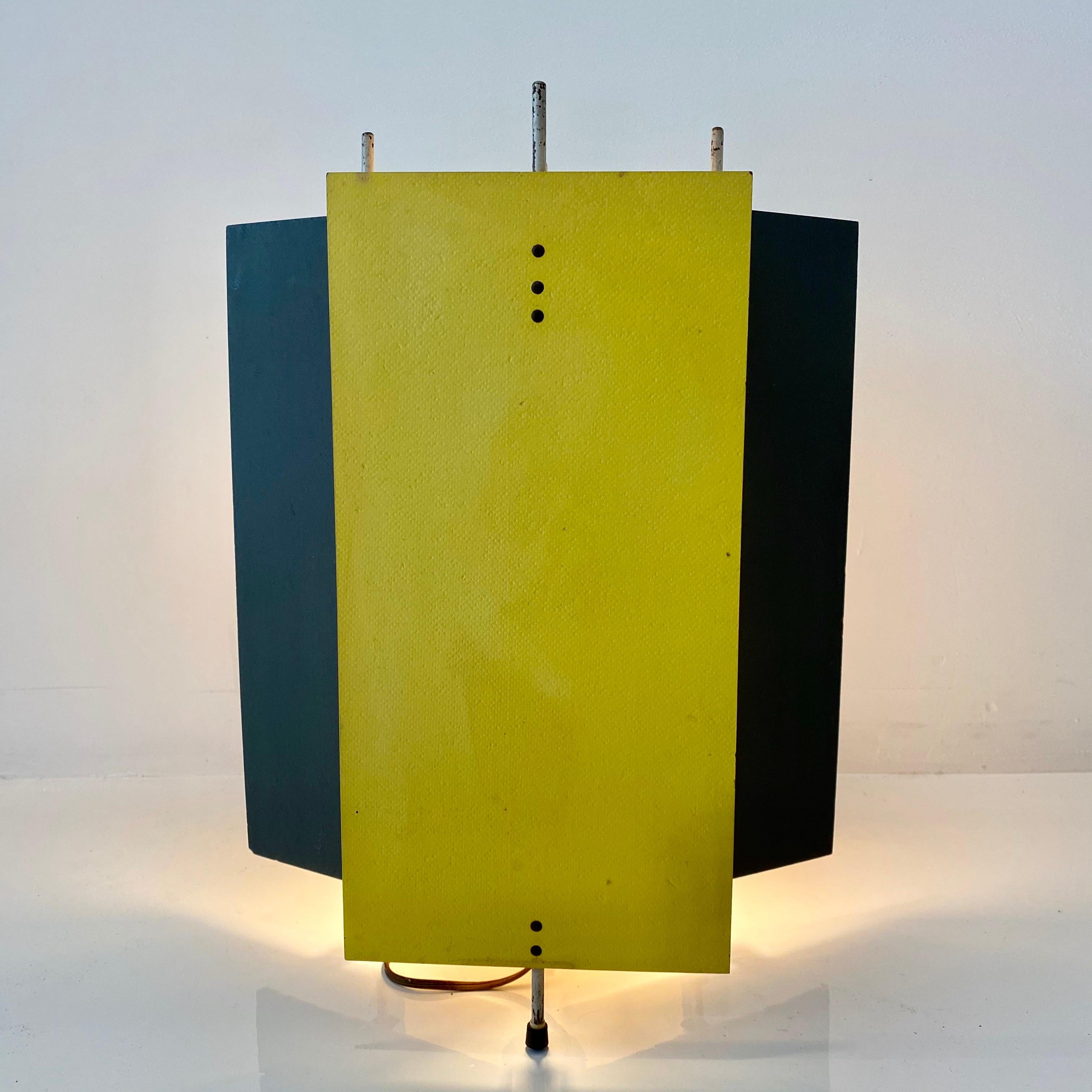 Very rare model T-6-G table lamp by Robert Gage. Lacquered Masonite panels in yellow and gray with a white enameled steel frame. Manufactured by Heifetz Manufacturing Co in 1951. Good vintage condition.