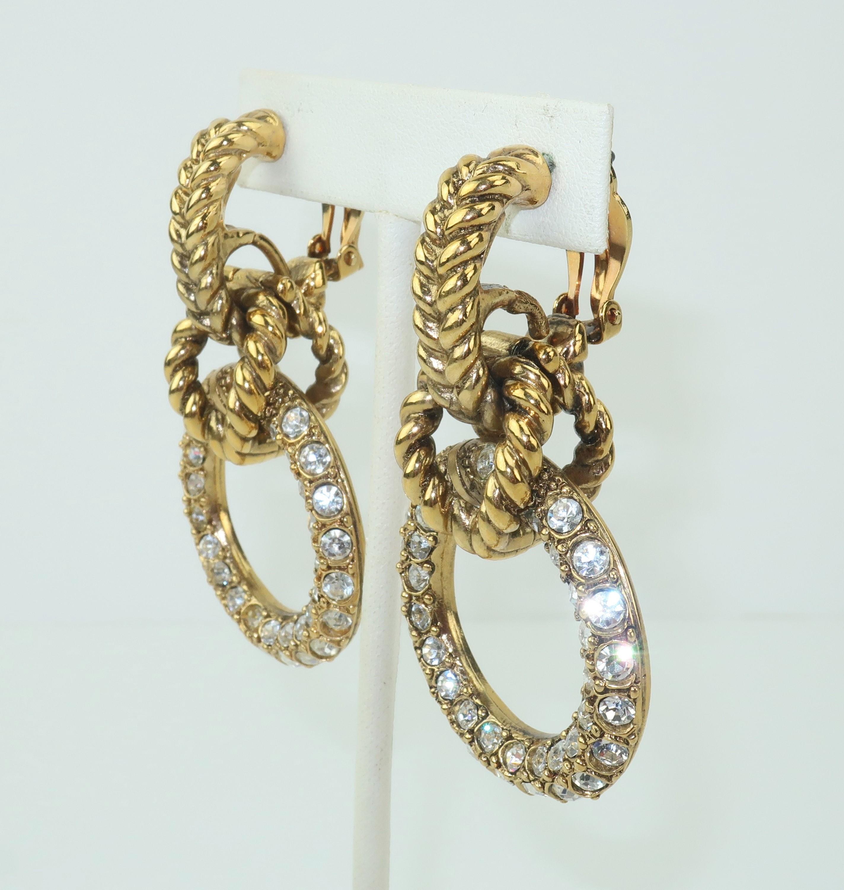 Robert Goossens is a name synonymous with the opulent costume jewelry produced for great Parisian fashion houses such as Chanel and Yves Saint Laurent.  These 1980's door knocker earrings are a nice example of his stylish work with a chunky