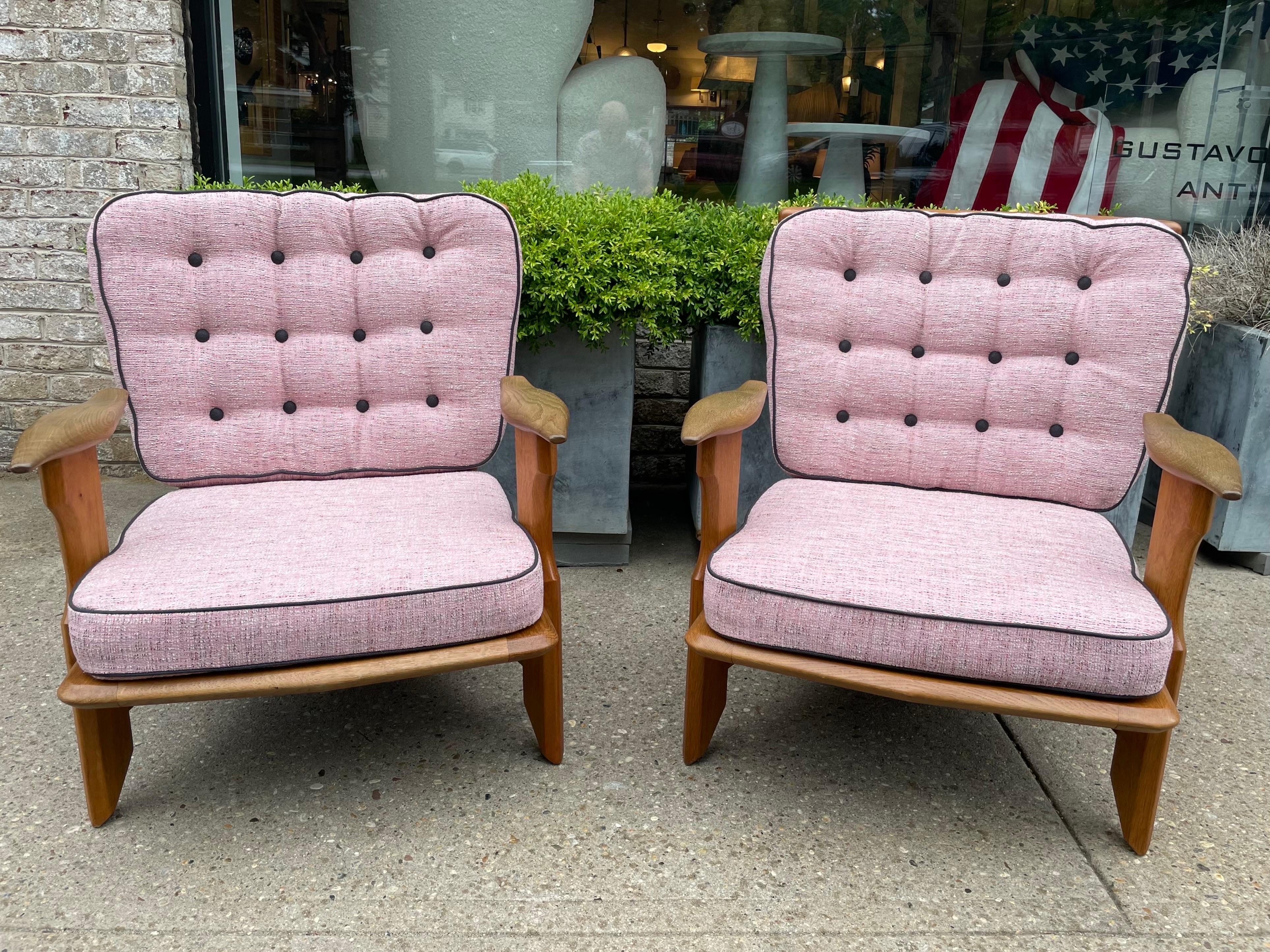 Robert Guillerme & Jacques Chambron, Votre Maison, 2 armchairs. Designed in 1950 / 60s. Oak wood, newly upholstered. Details include floating sculptural armrests, a wide back and wonderful cotton/wool fabric following the original Chambron designs.