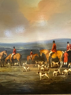 English fox hunting scene with fox hounds, huntsman on horse back in a landscape