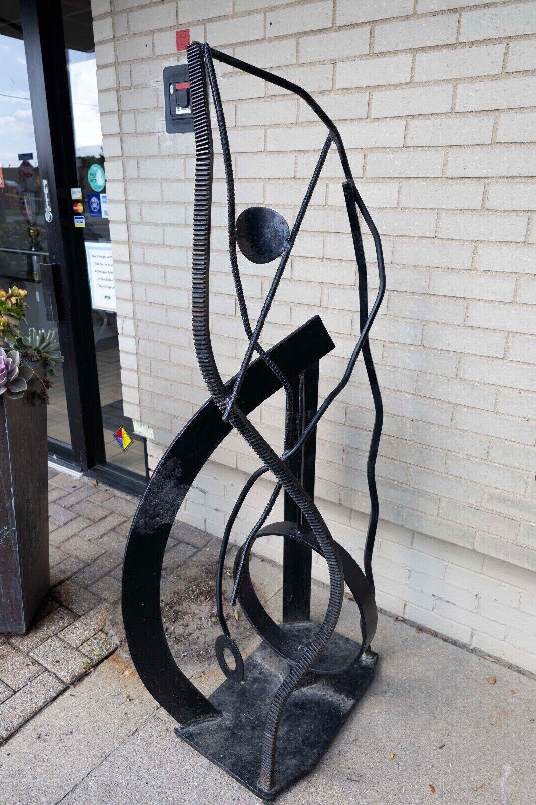 A forged painted copper metal, abstract floor sculpture, by Michigan artist Robert D. Hansen. Could be displayed indoors or outdoors. The perfect modern statement. The dimensions are 25