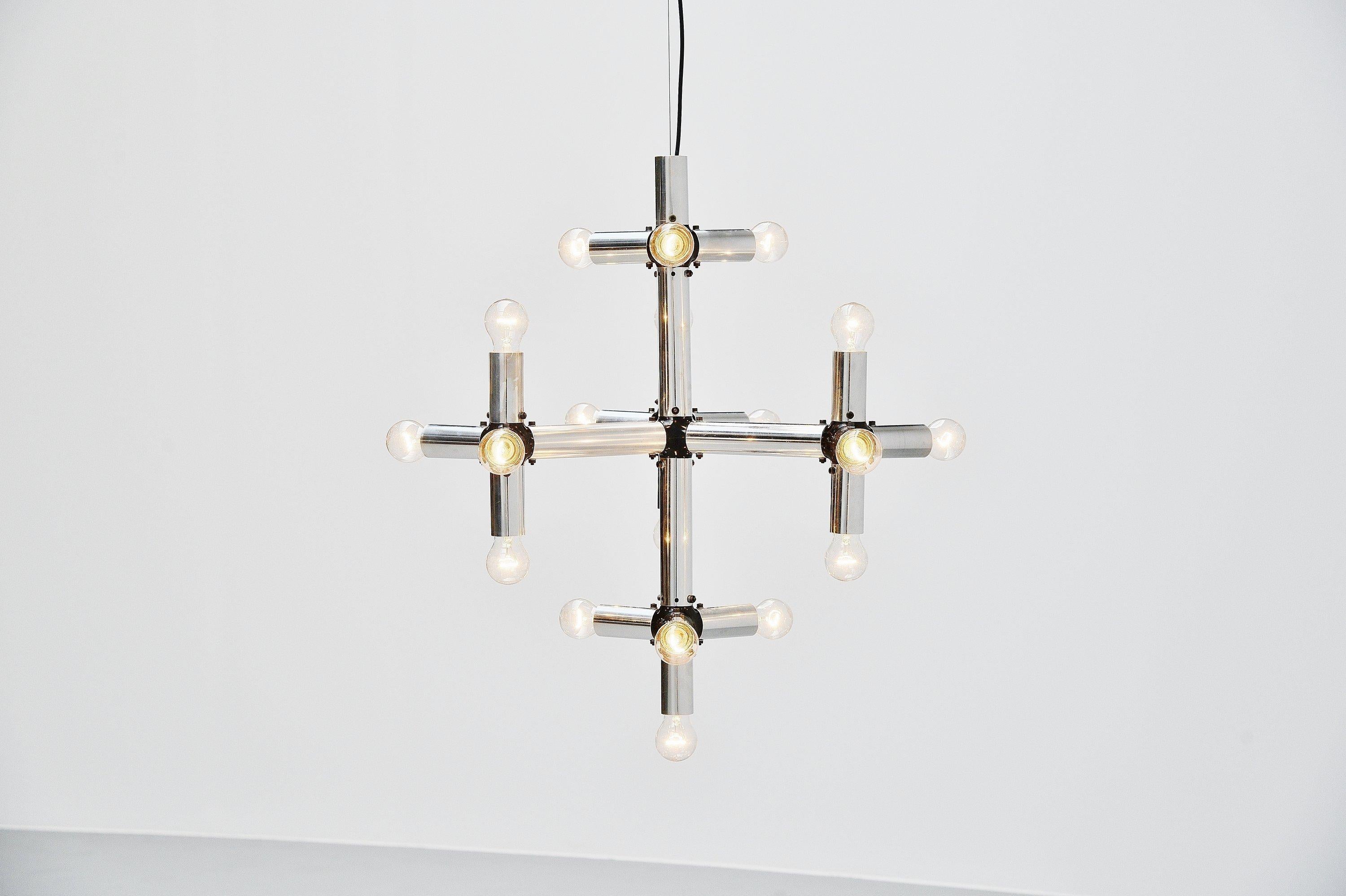 Sculptural ‘lichtstruktur’ chandelier designed by Robert Haussmann and manufactured by Swiss lamp, Switzerland, 1969. The lamp was designed by the architect Robert Haussmann and it was a modular system, could be built however wanted. Was often used
