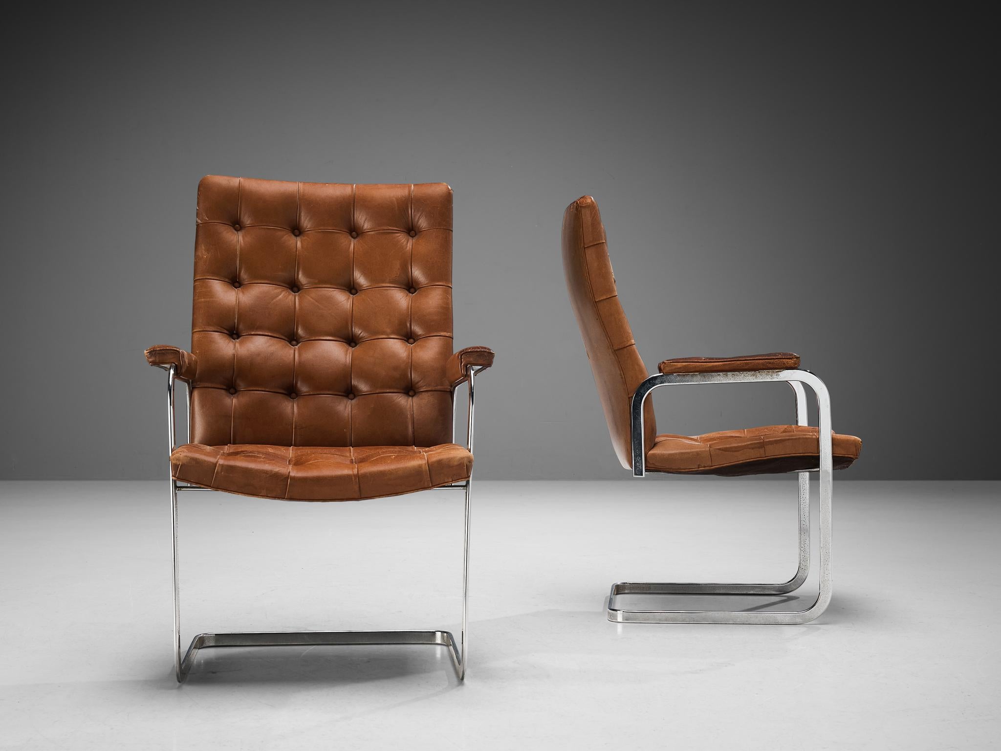 Acier Paire de fauteuils en cuir cognac Robert Haussmann pour De Sede  en vente